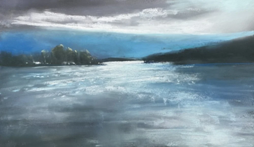 Abstract pastel painting of a river or lake with mountains and cloudy sky in the background.