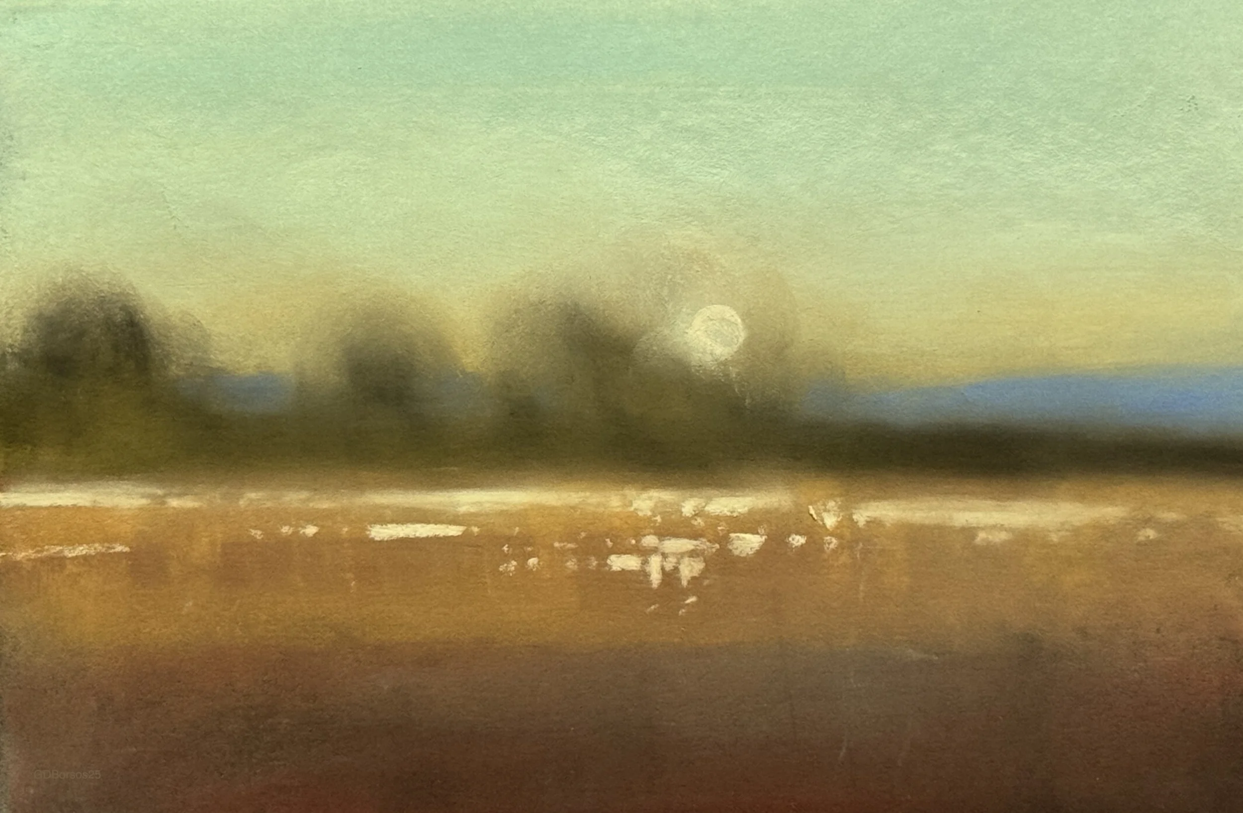 Blurred landscape view of a rural area at sunset with trees on either side of the horizon and a road in the foreground.