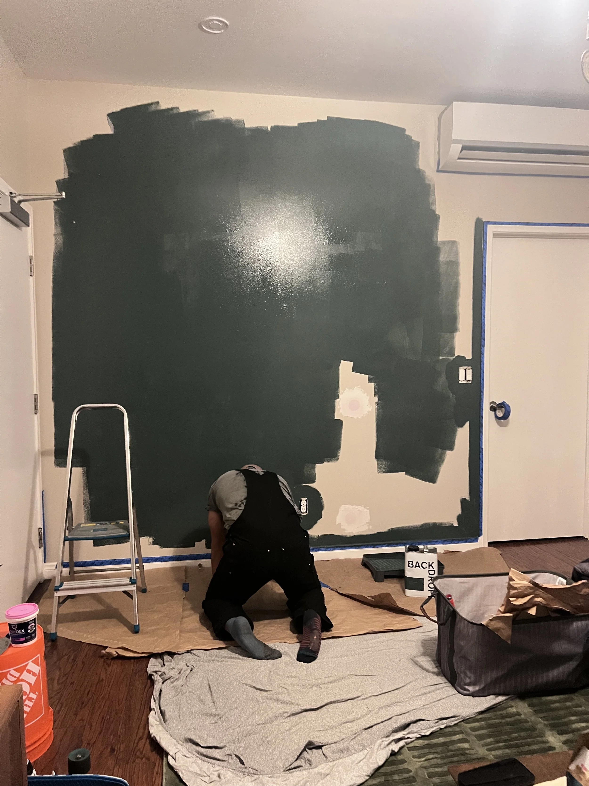 MID paint application to the living room wall adding depth and height to the taller side of the vaulted ceiling. 
Finished project pics to come...