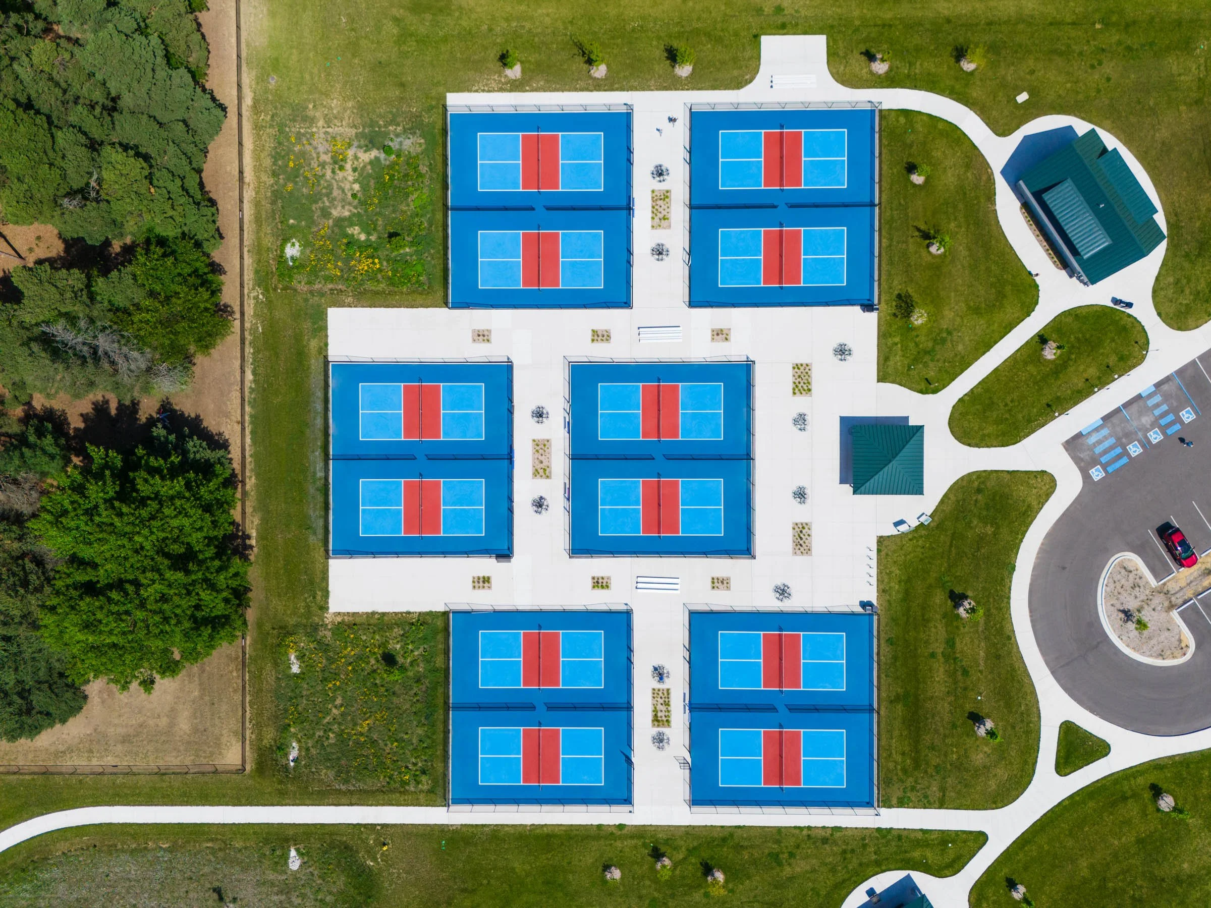Aerial view of Schmidt Heritage pickleball court complex built by Racquet Sports Inc., Michigan sport court contractors.