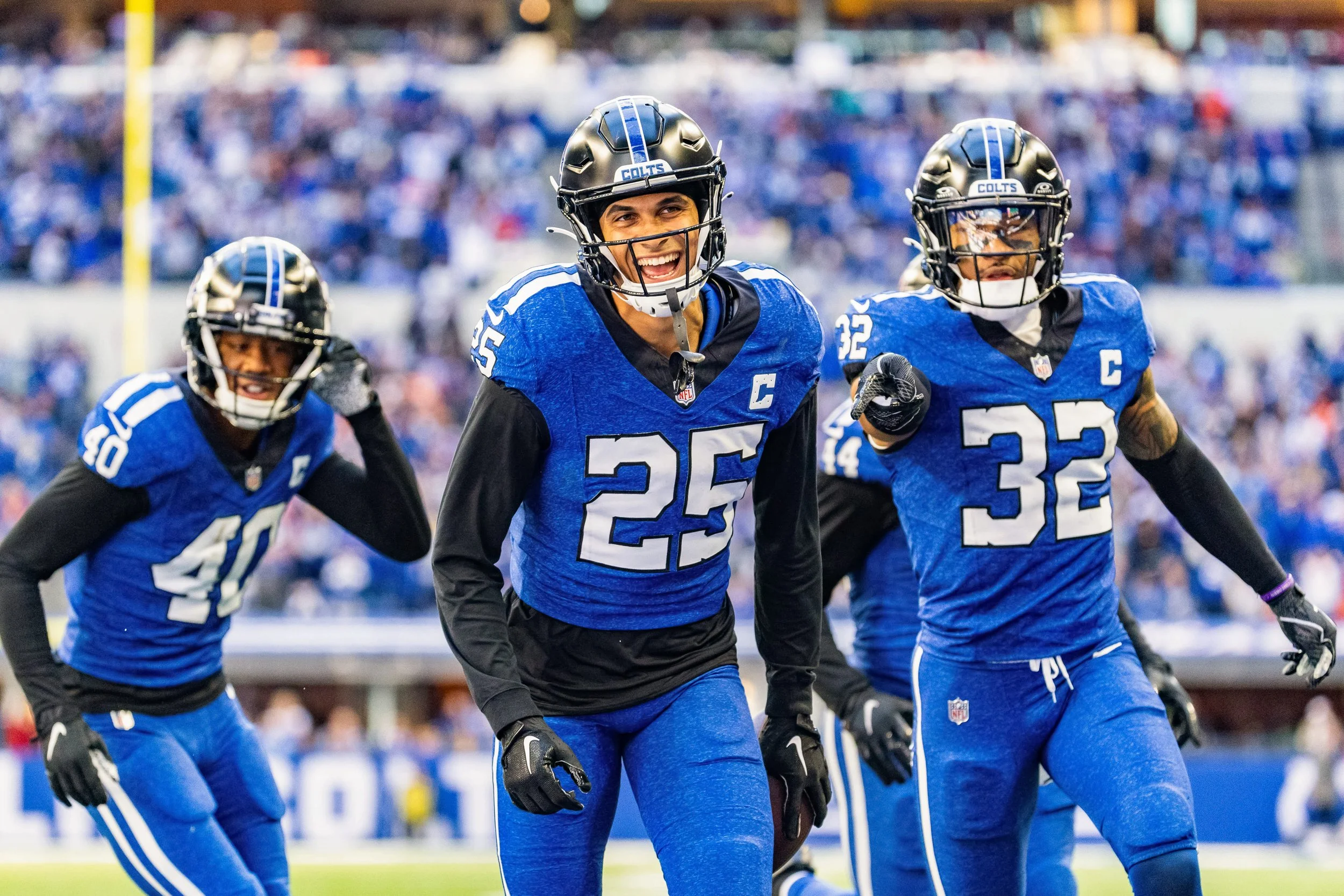Indianapolis Colts safety Rodney Thomas II (25) celebrates his interception with teammates in the second half against the Cleveland Browns at Lucas Oil Stadium. Mandatory Credit: Trevor Ruszkowski-Imagn Images