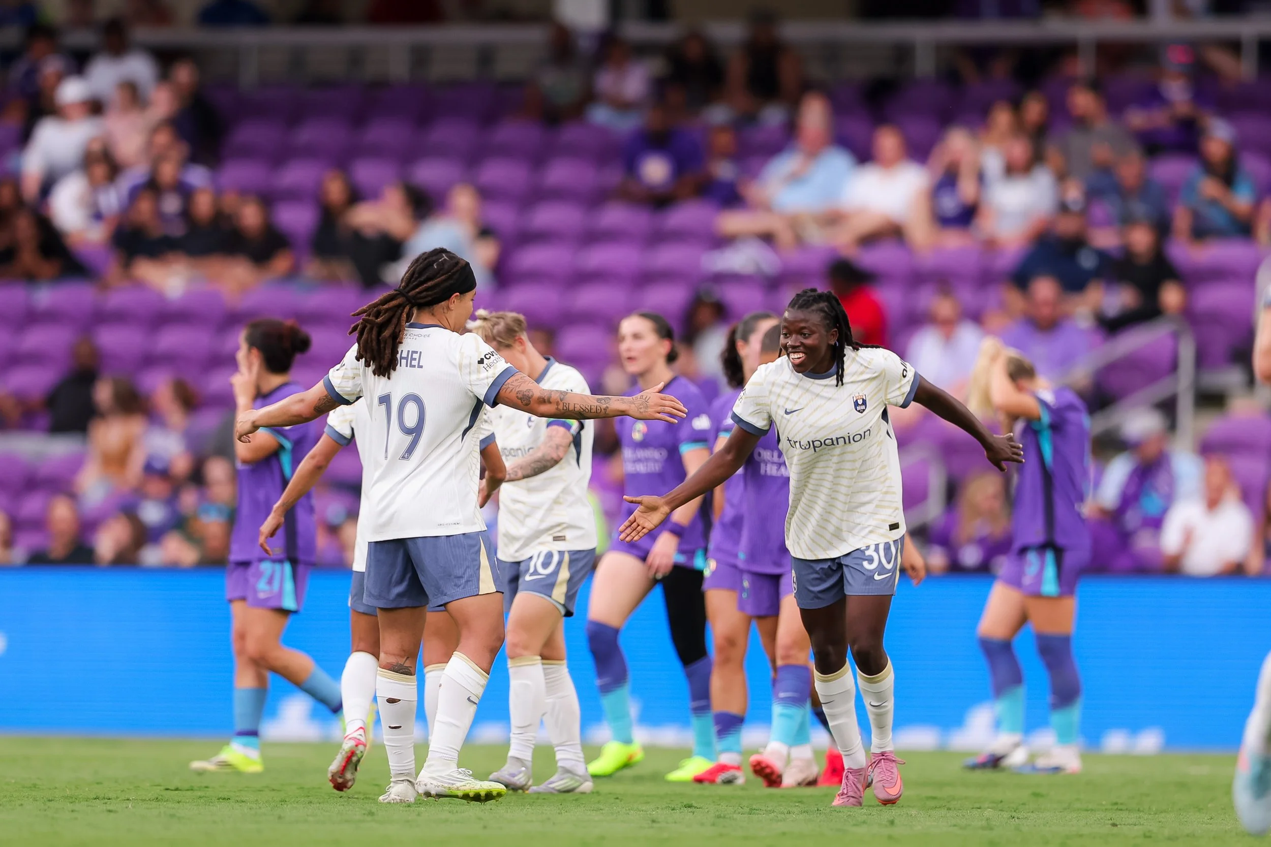 Reign Overcome Travel Mishap, Weather Delay in Opening Day Win