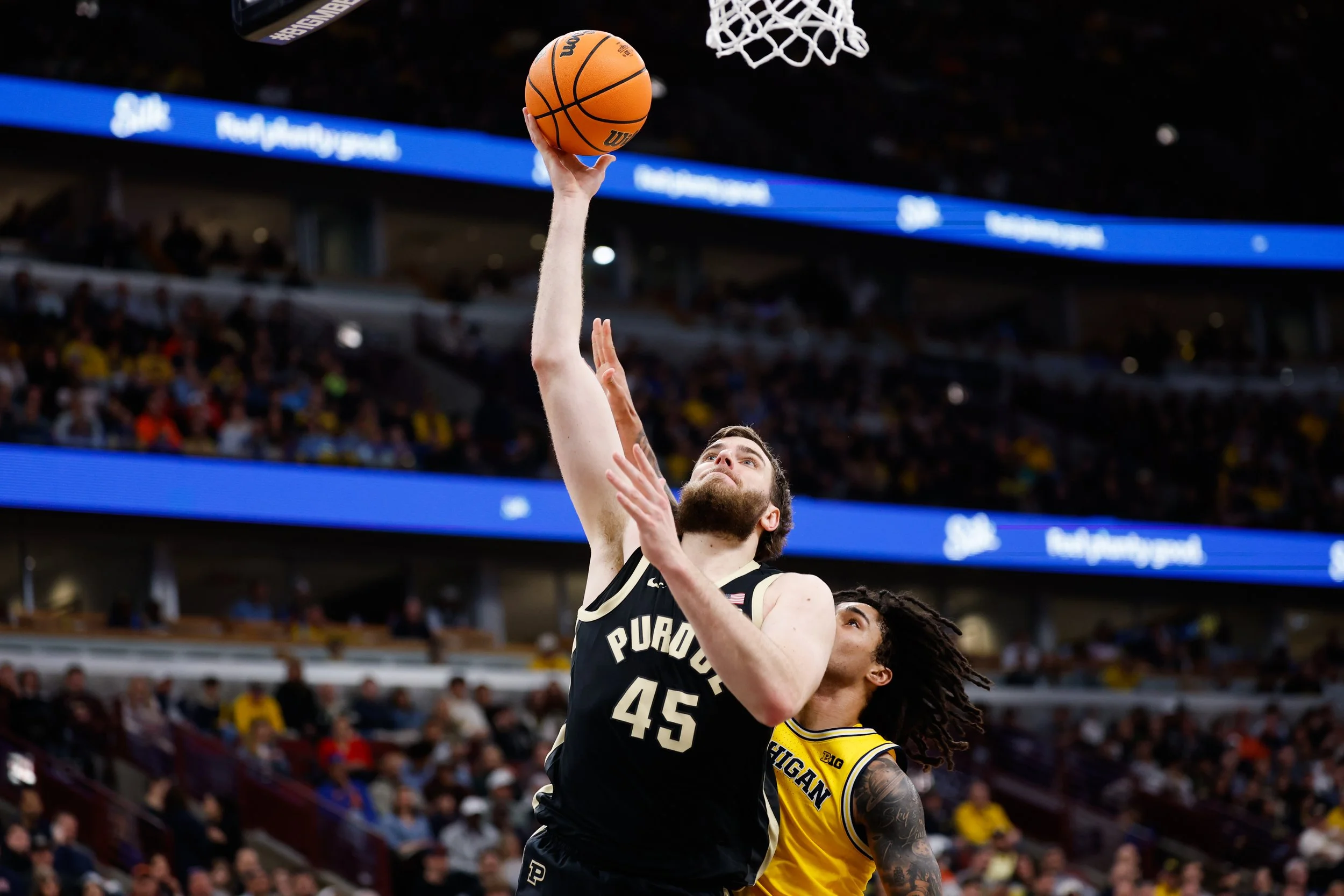 Which Former Cougars Will Be Starring in March Madness?