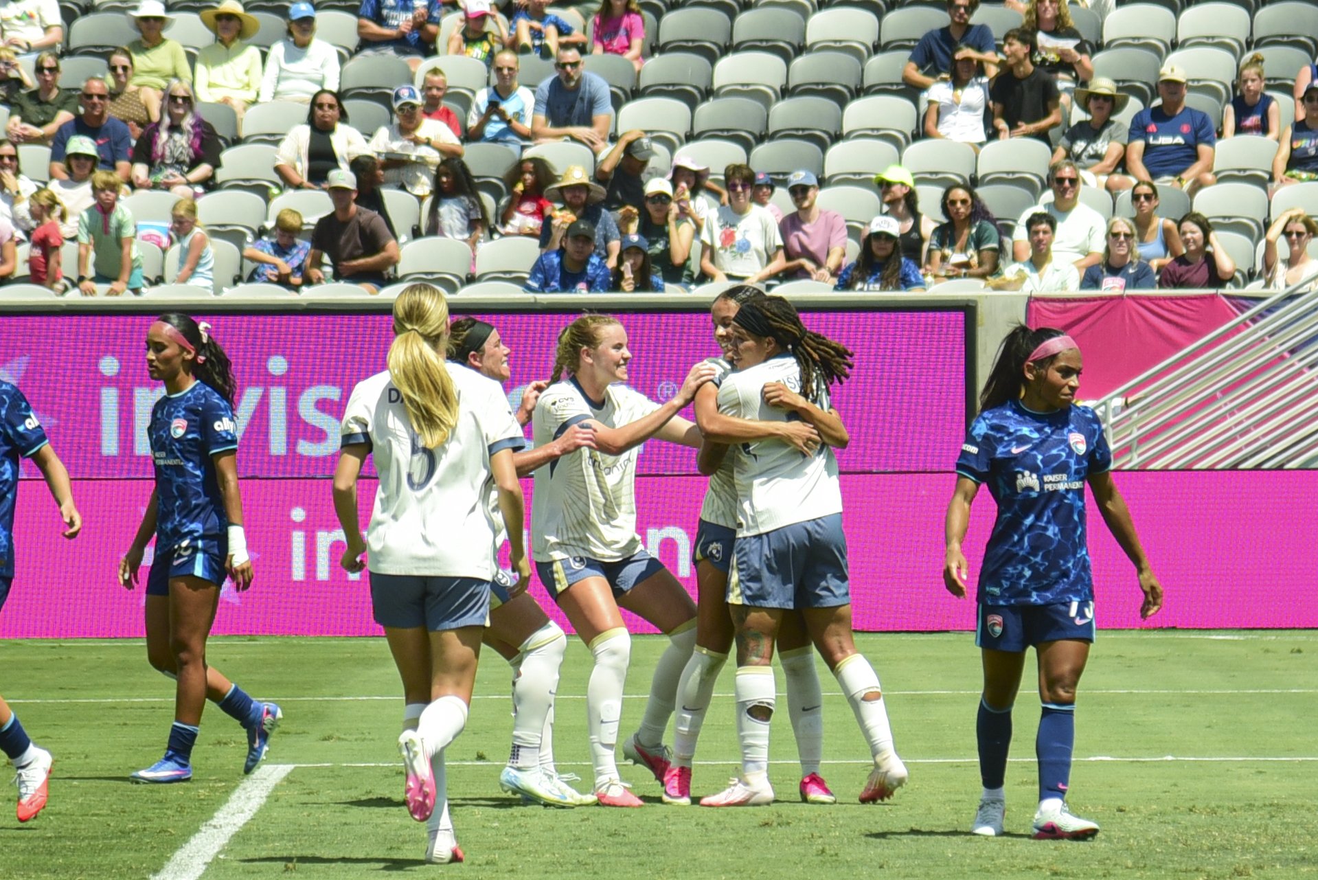 Dickey Stars in Return as Reign Hold Off Wave for Quality Road Win