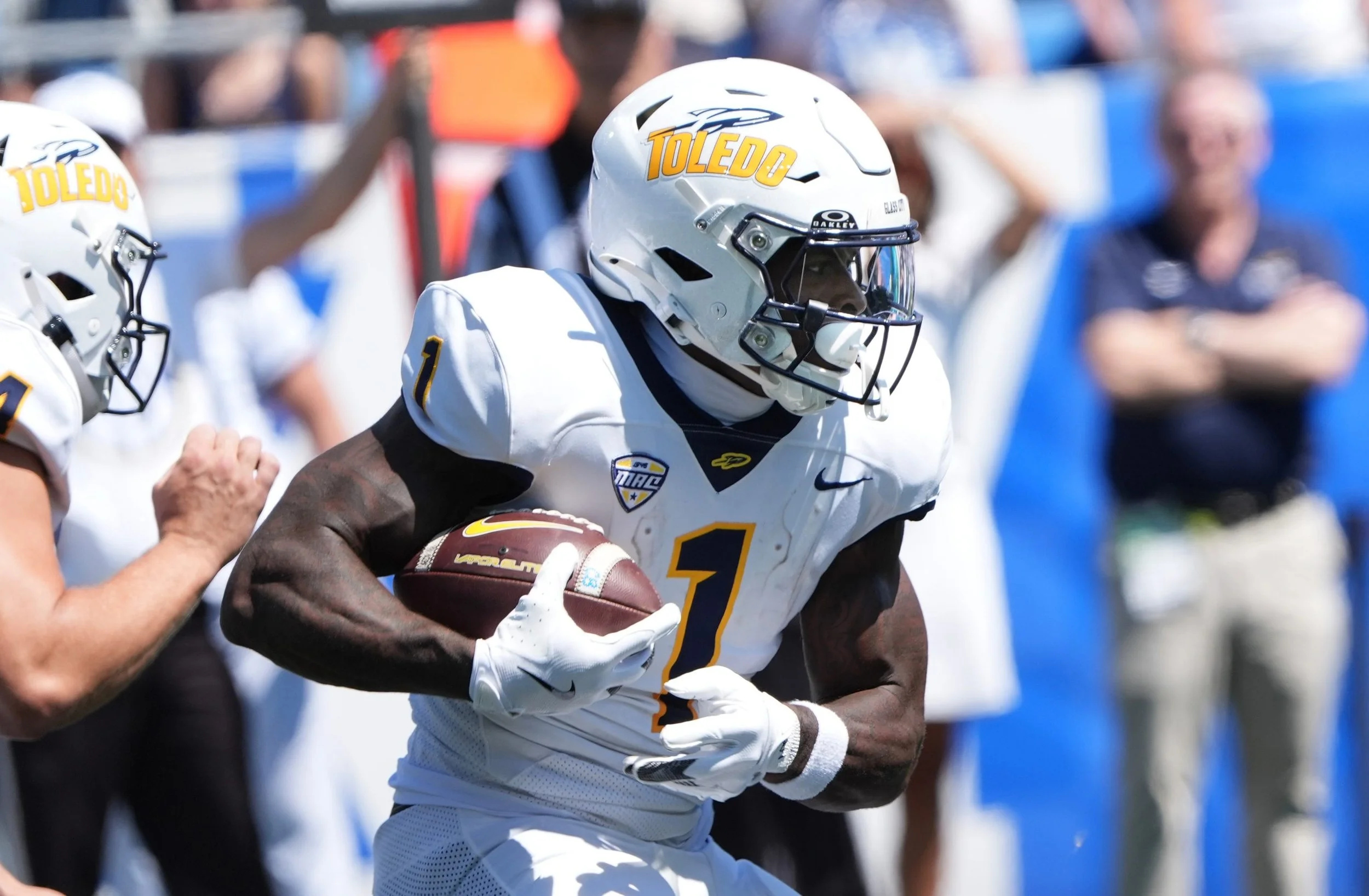 Toledo’s Chip Trayanum running with the ball against Kentucky Saturday afternoon at Kroger Field. Credit: Scott Utterback/Courier Journal / USA TODAY NETWORK via Imagn Images