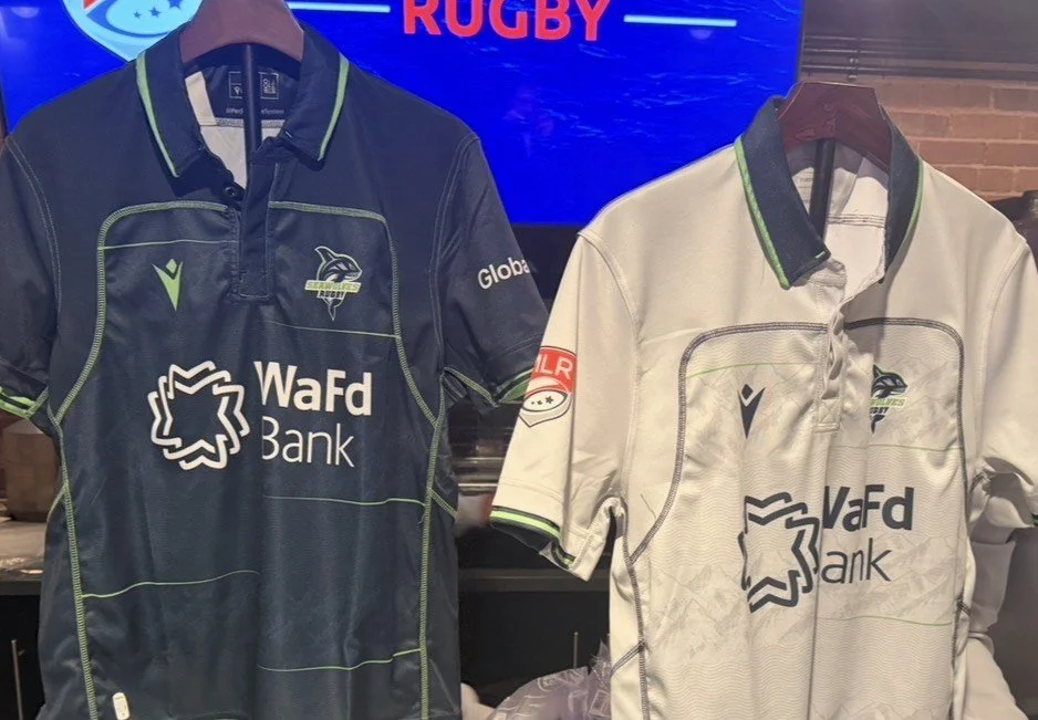 The Seawolves’ home (left) and road (kits) on display at the preseason kickoff on March 4, 2026. Credit: Callaghan Bluechel/Emerald City Spectrum.