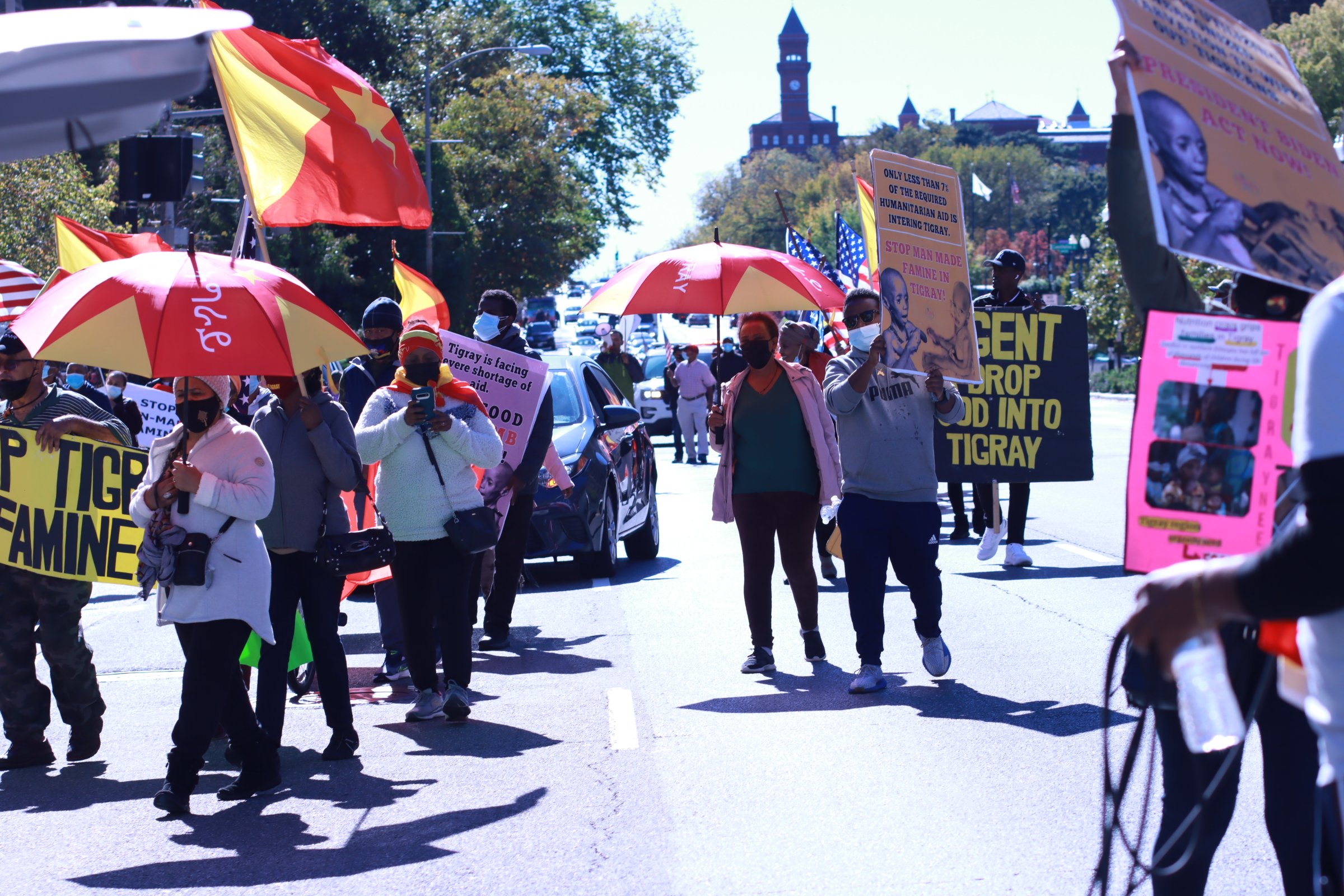tigray ethiopian protest in washington dc during biden presidency sunny day with crowd protesting for human rights for tigray 