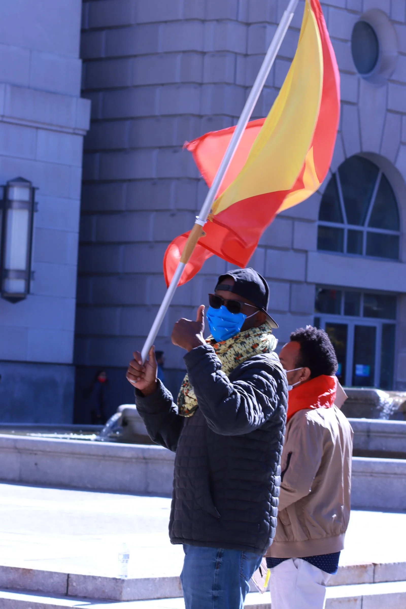 tigray ethiopian protest in washington dc during biden presidency. tigray flag flyimg high in the sky