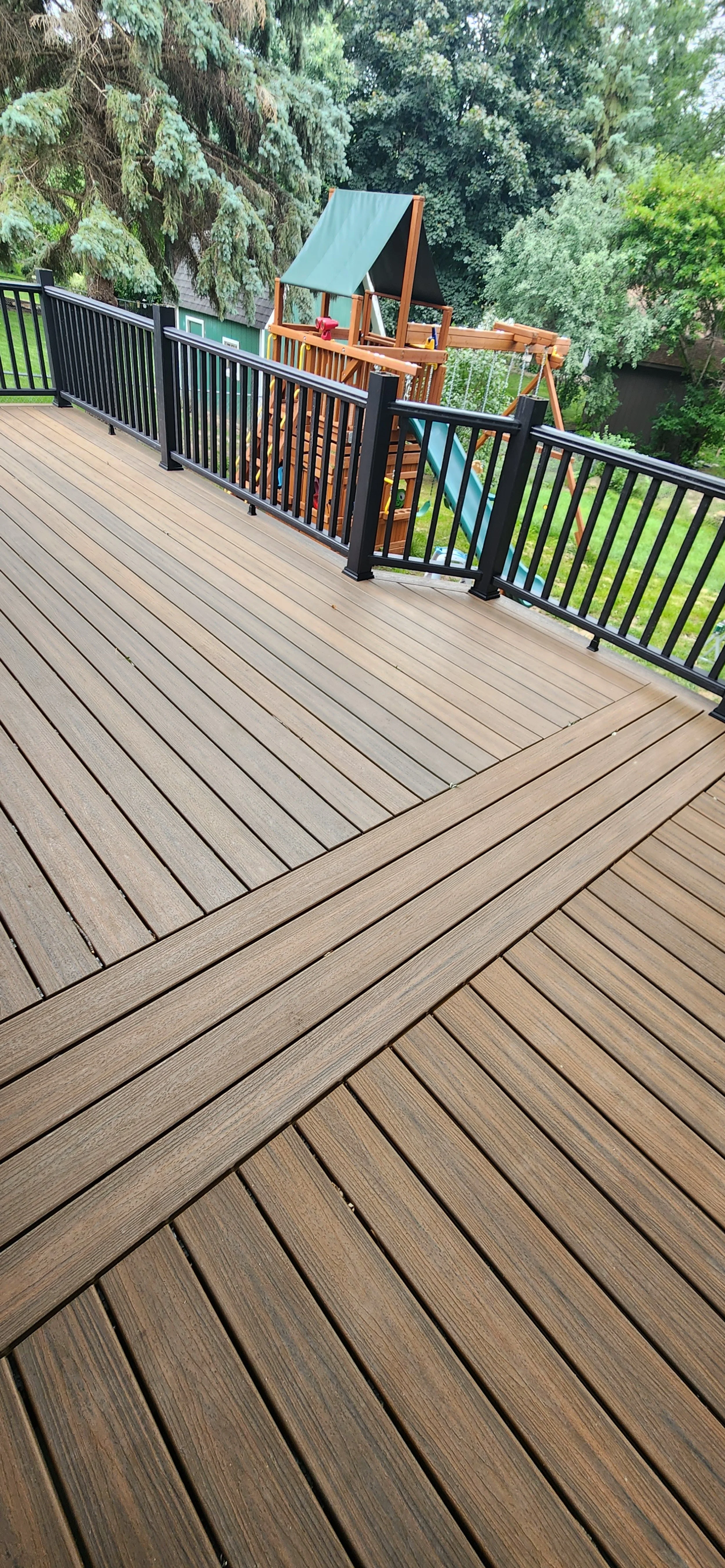36x19 foot demo and rebuild, rotten wood, staircase, and replaced a bunch of joists. aluminum railing and composite deck boards with picture framing