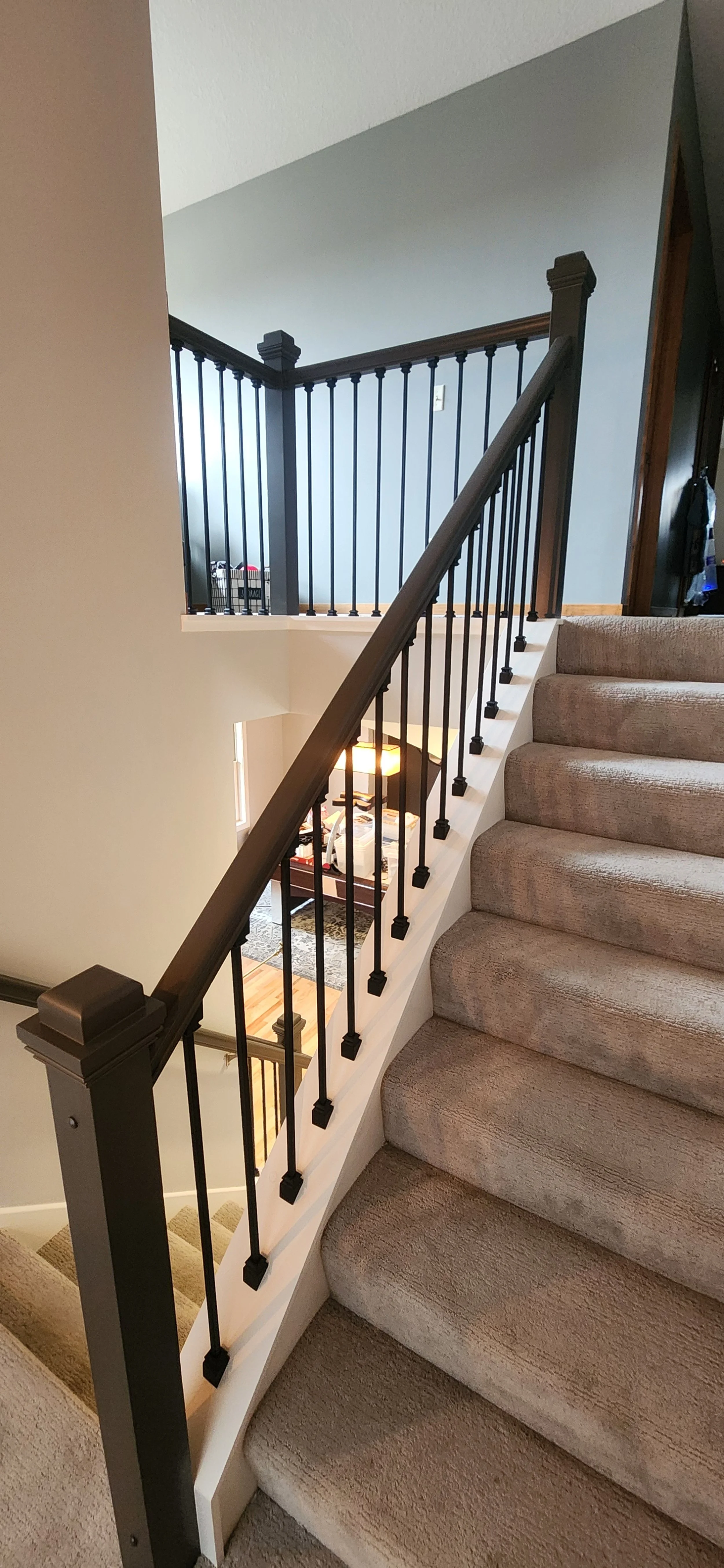 Had the ol' golden oak hand rail and balusters. 
