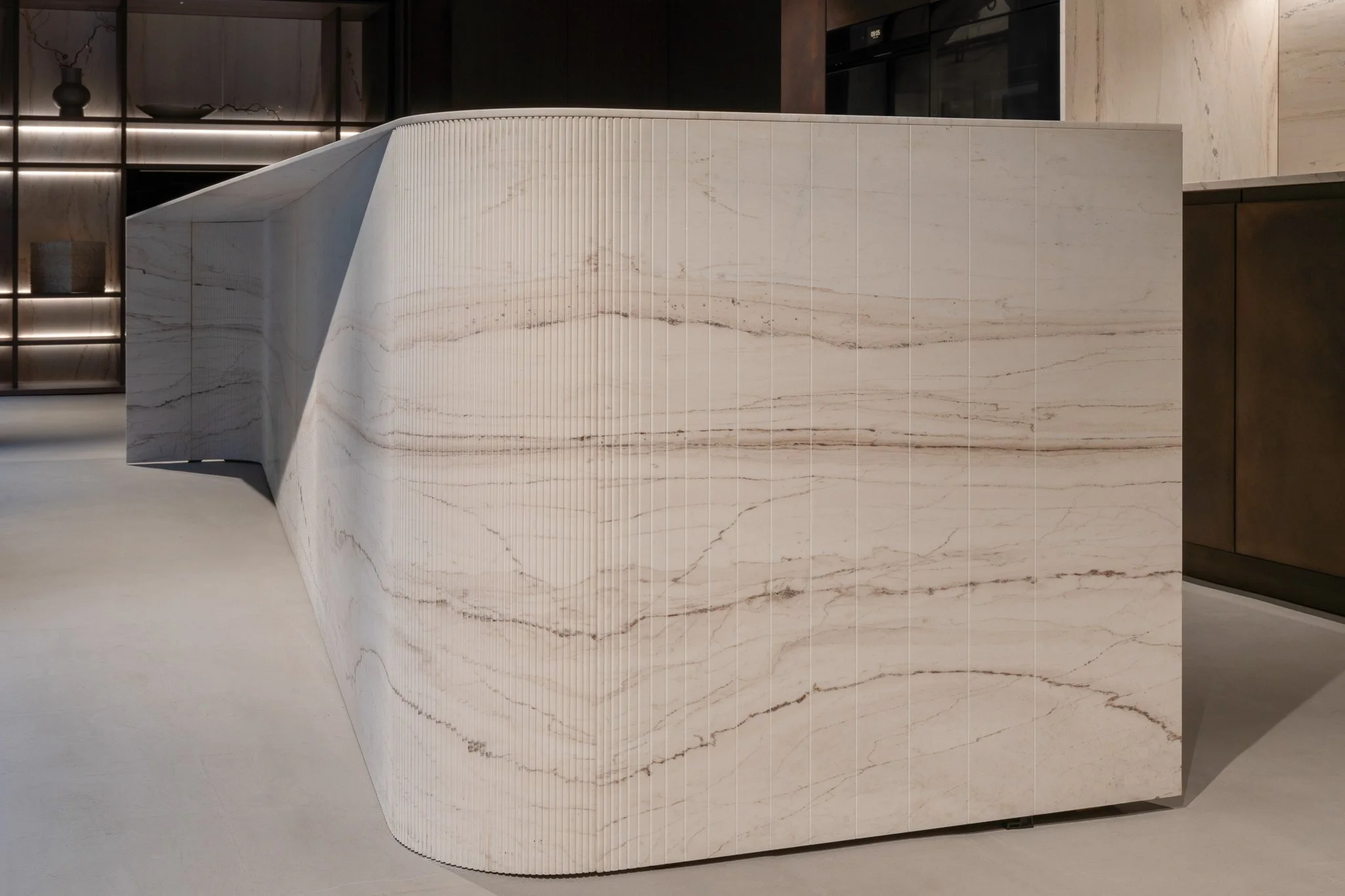 The Cut luxury curved fluted stone kitchen island Las Vegas
