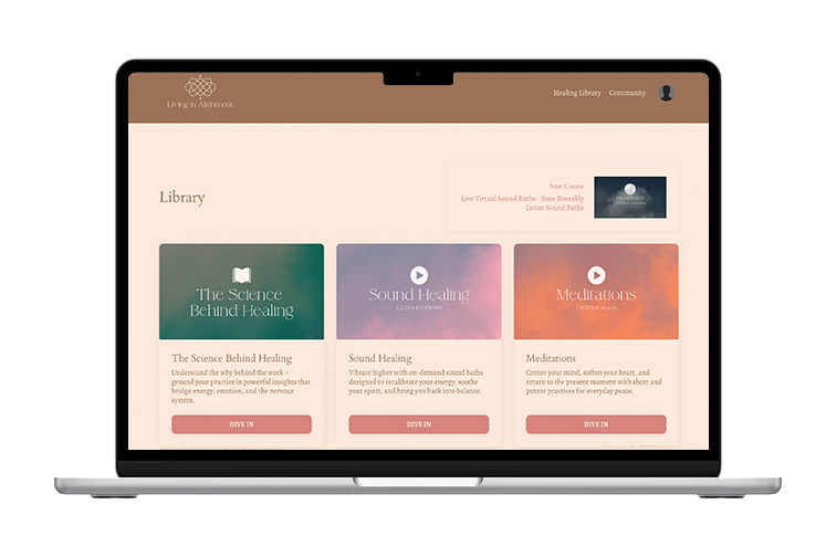 Laptop displaying a webpage showcasing the 'Living in Alignment' membership healing library. Call-to-action buttons inviting you to 'Dive In'.