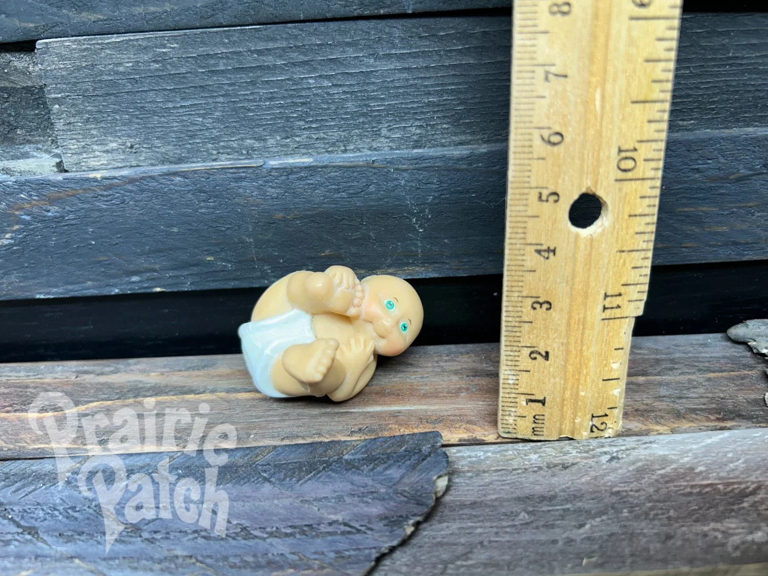 Rolling baby figurine
