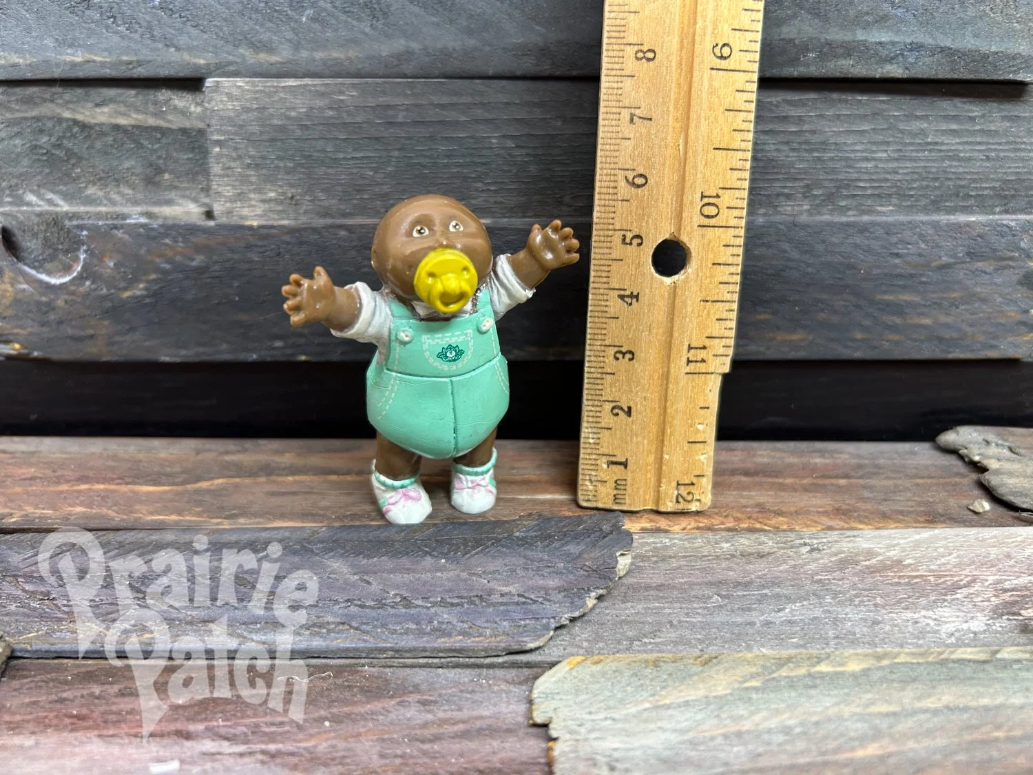 Pacifier baby figurine