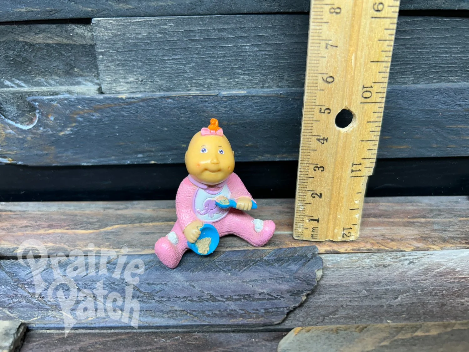 Eating baby figurine