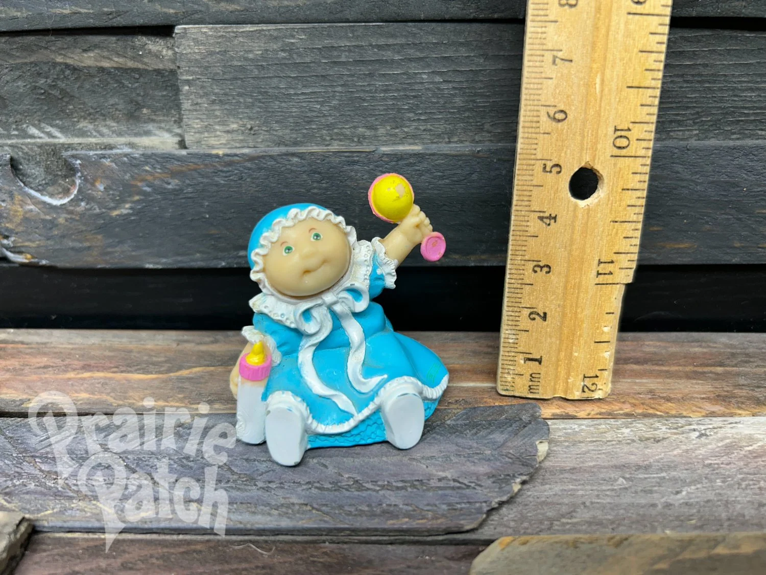 Rattle baby figurine