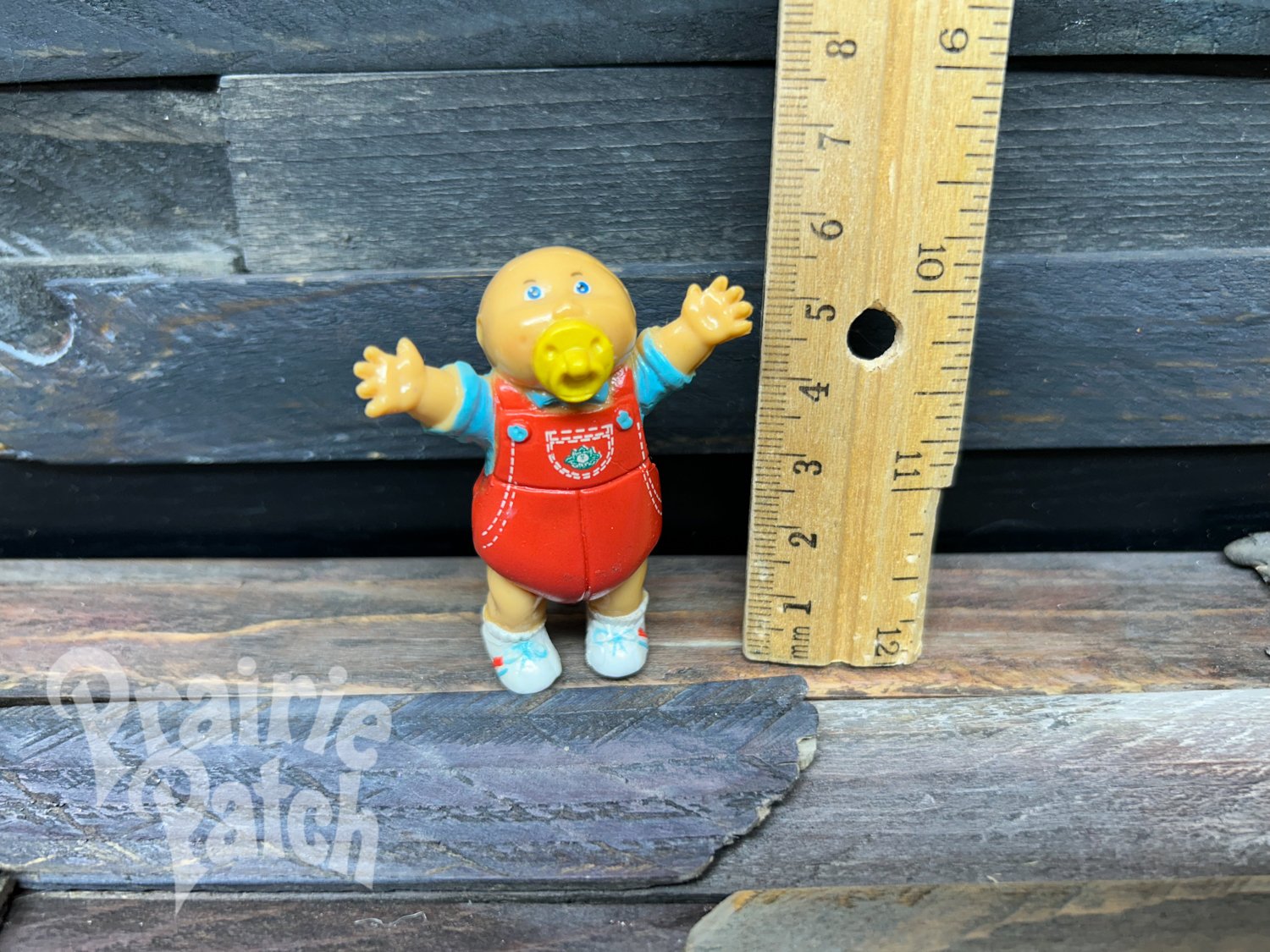 Pacifier baby figurine
