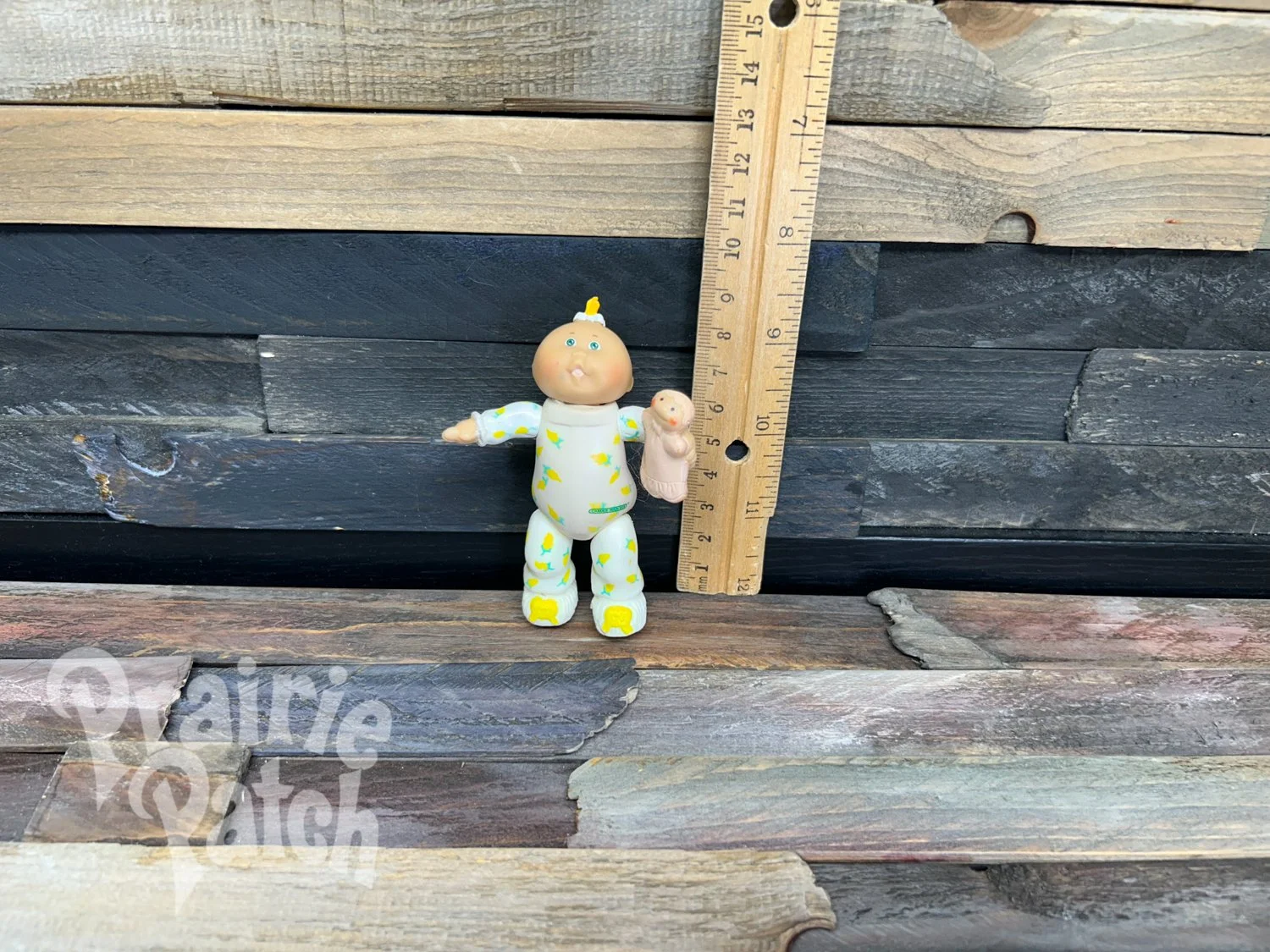Figurine with doll