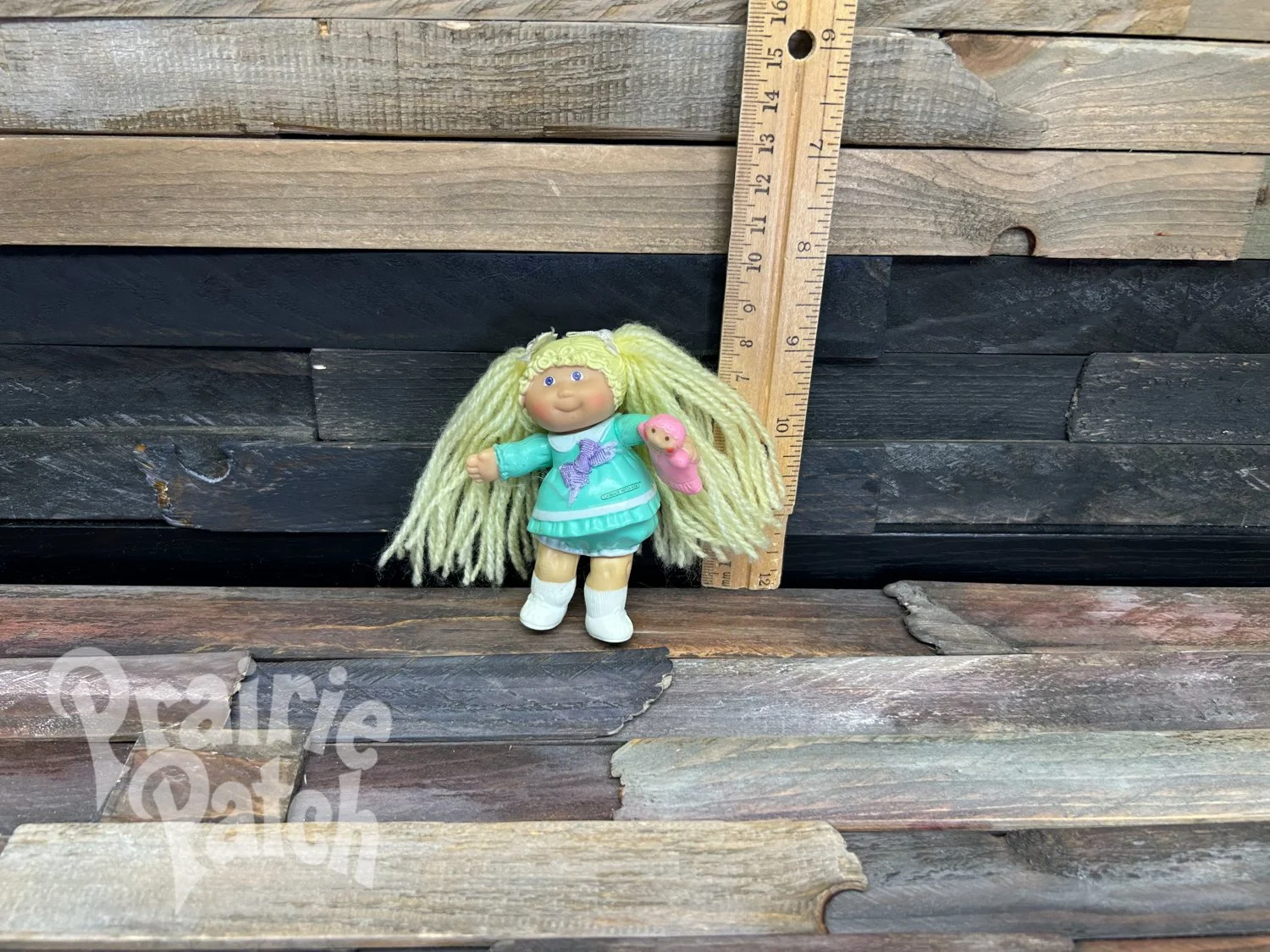 Figurine with doll