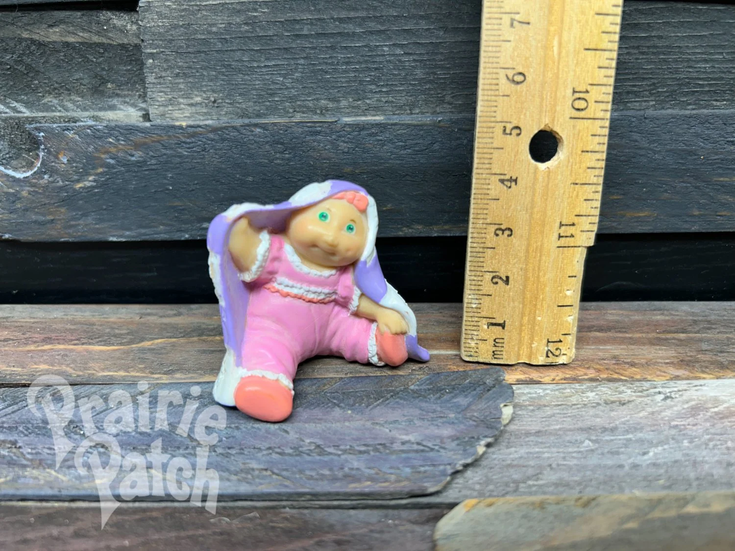 Peek a boo baby figurine