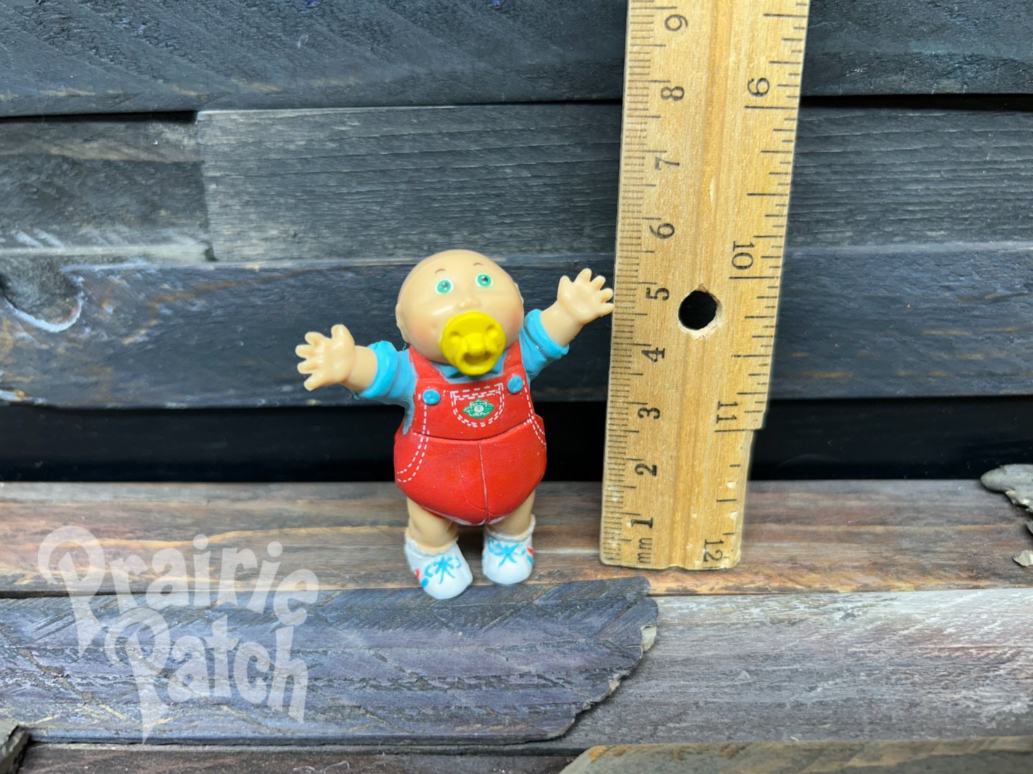 Pacifier baby figurine