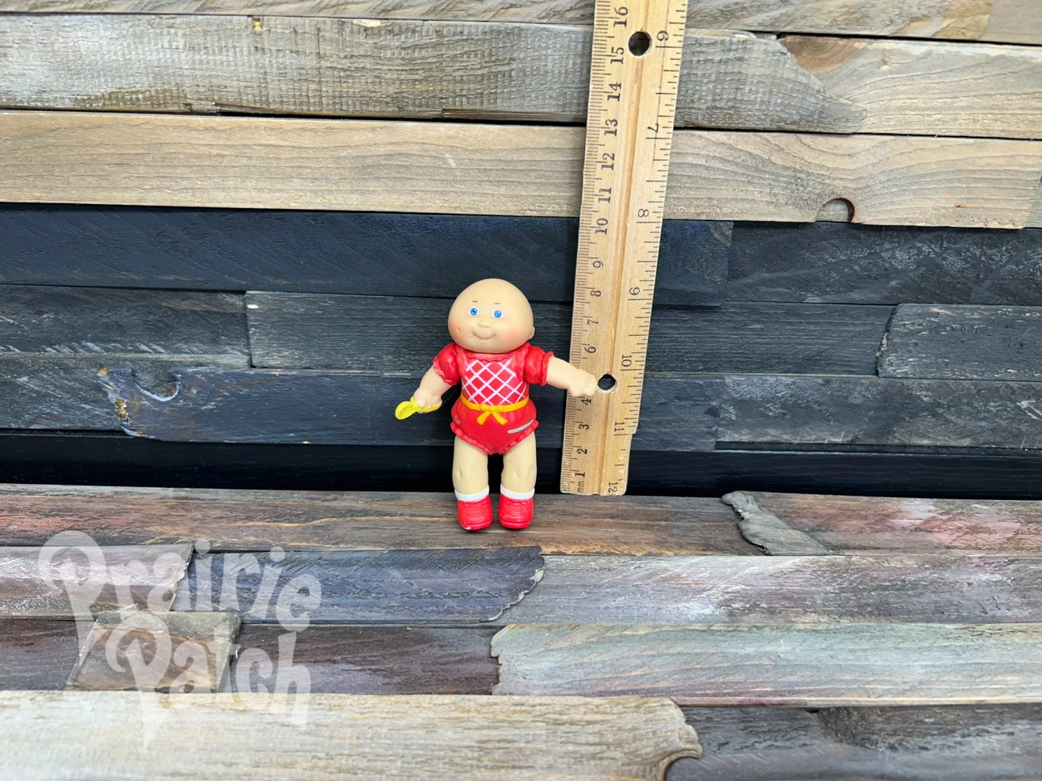 Figurine with spoon