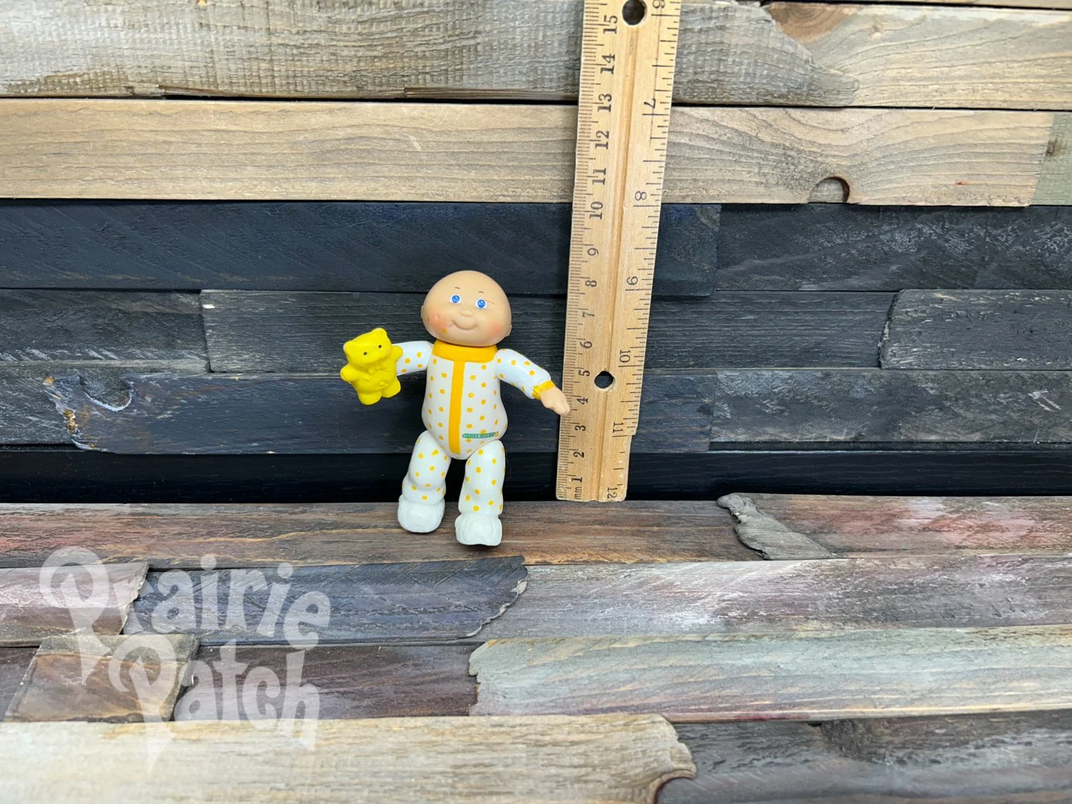 Figurine with teddy bear