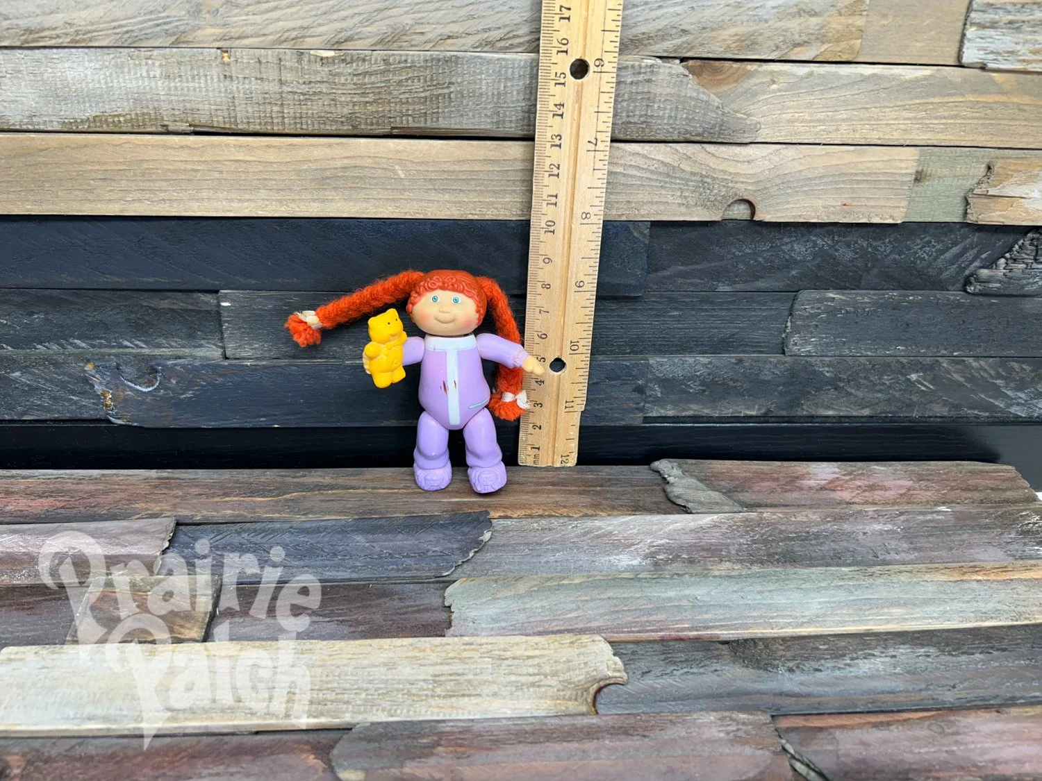 Figurine with teddy bear