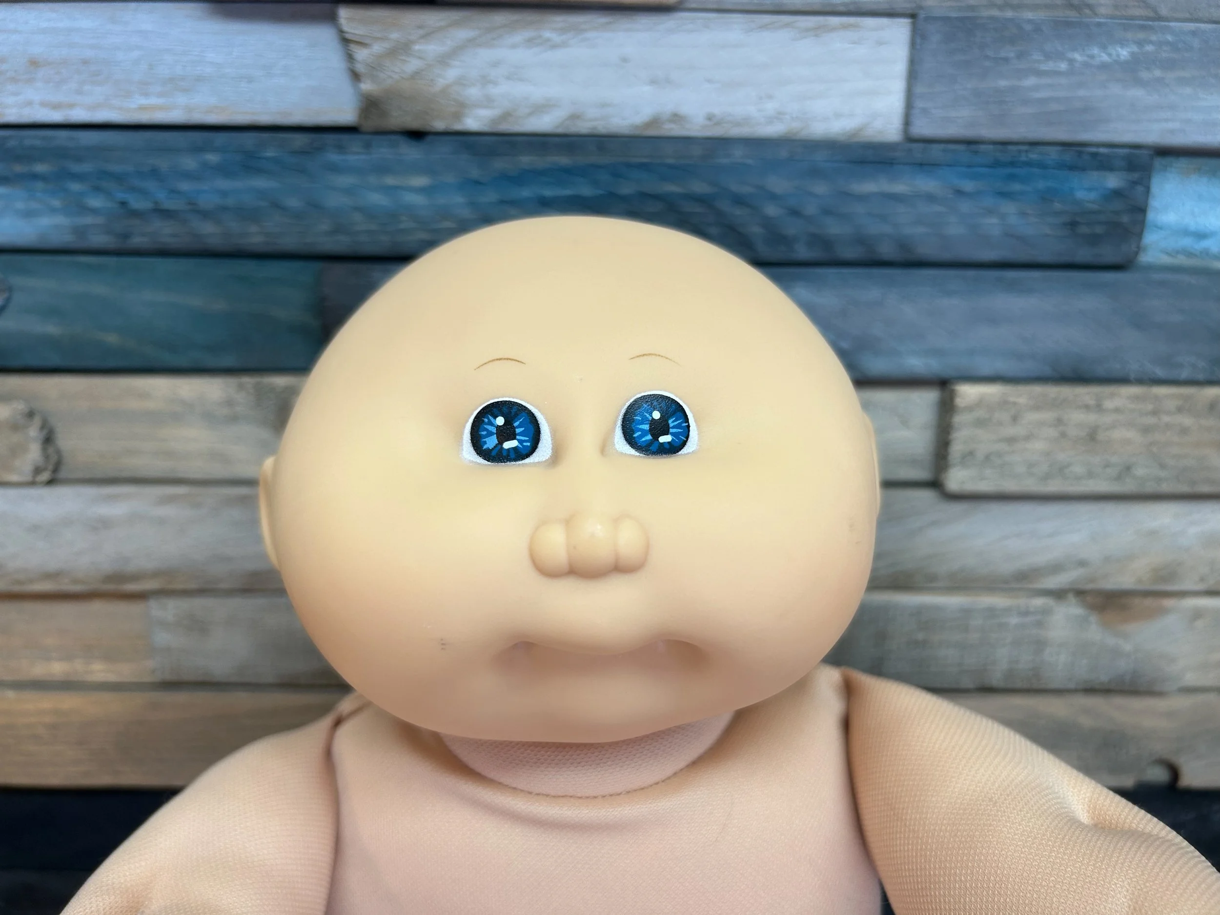 Bald & blue eyes