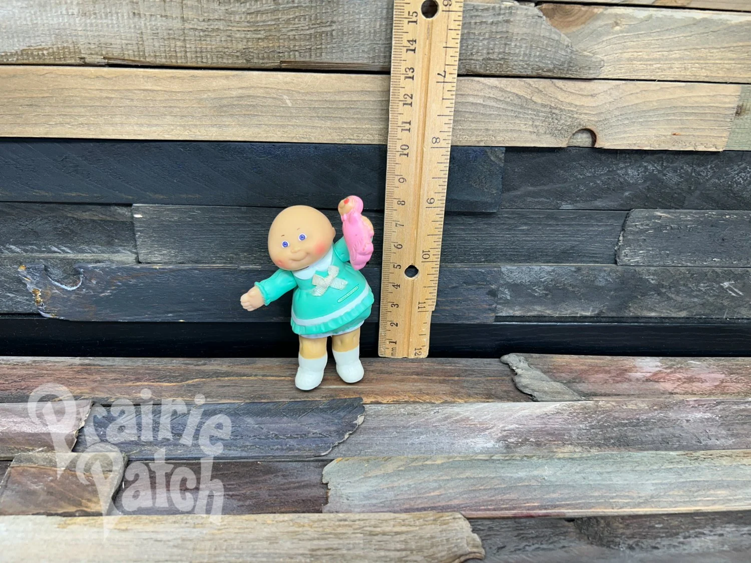 Figurine with doll