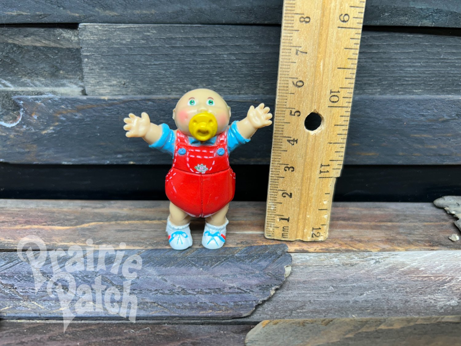 Pacifier baby figurine