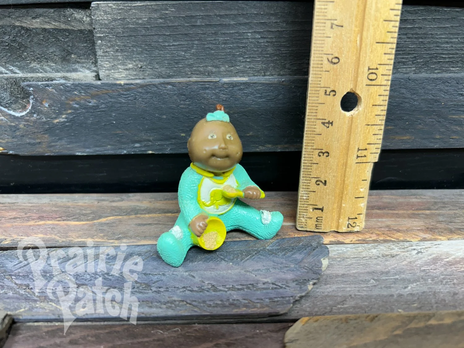 Eating baby figurine
