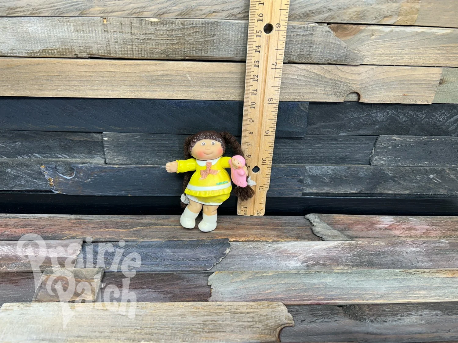 Figurine with doll