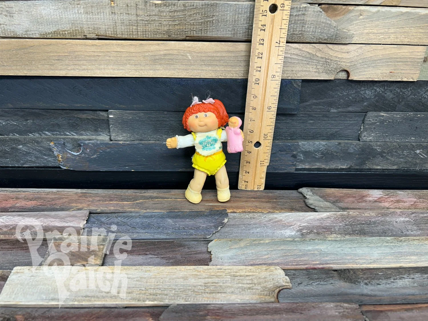 Figurine with doll