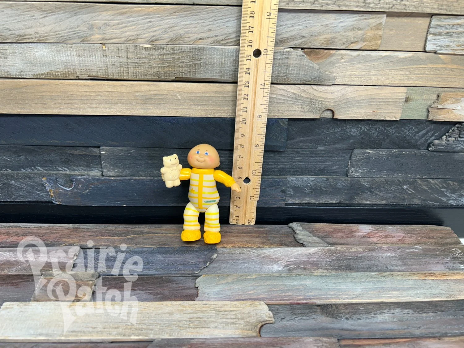 Figurine with teddy bear