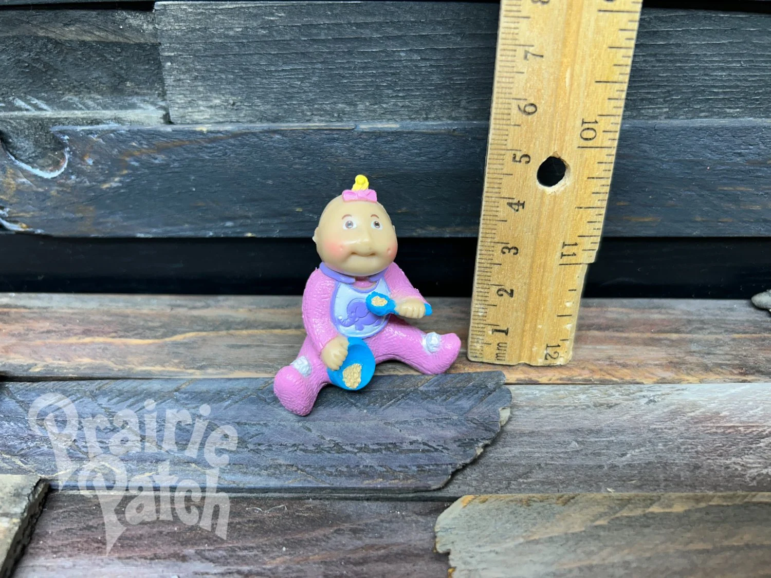 Eating baby figurine
