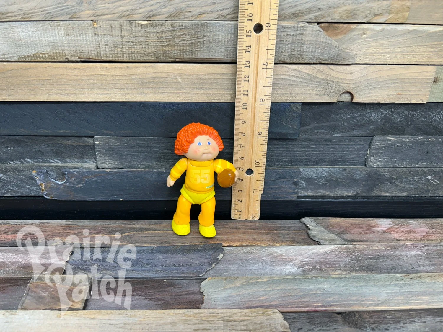 Figurine with football