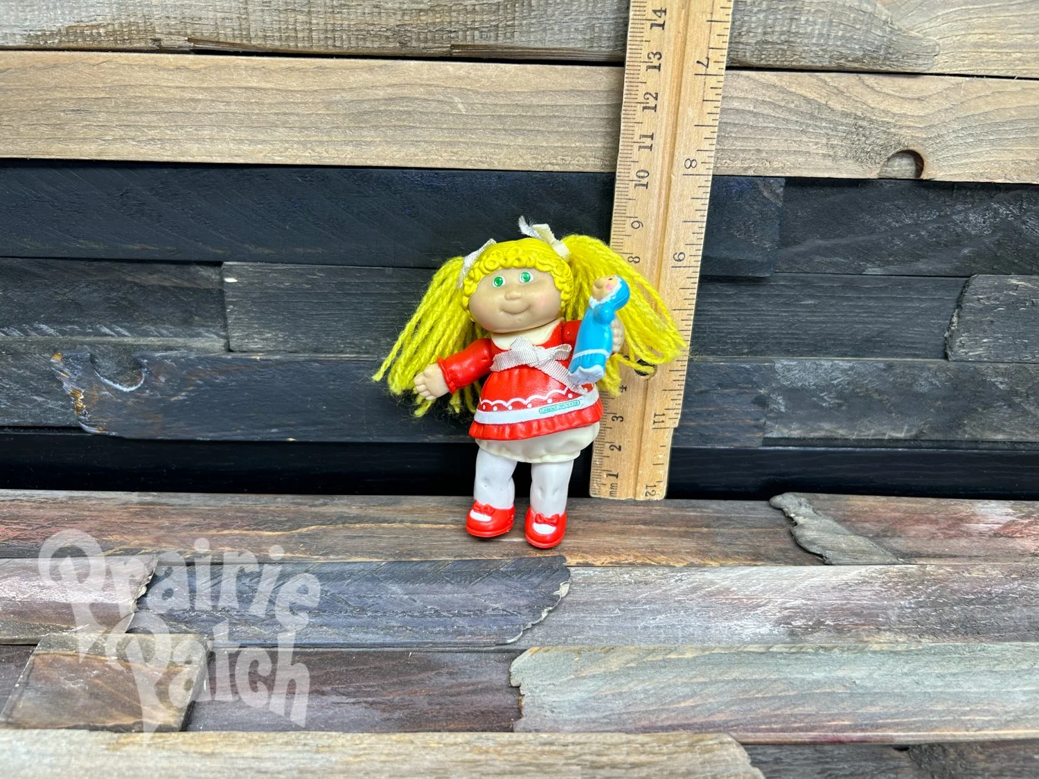 Figurine with doll