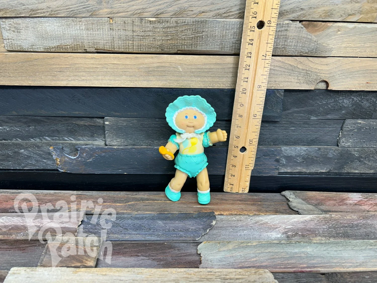 Figurine with spoon