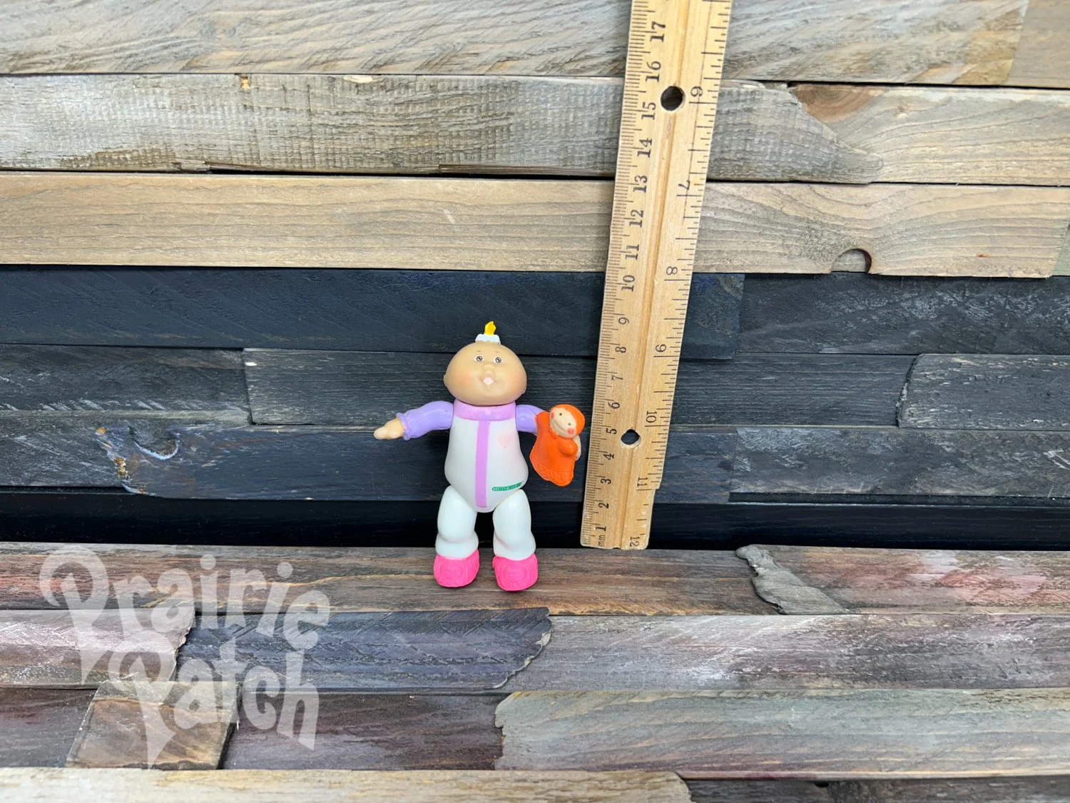 Figurine with doll
