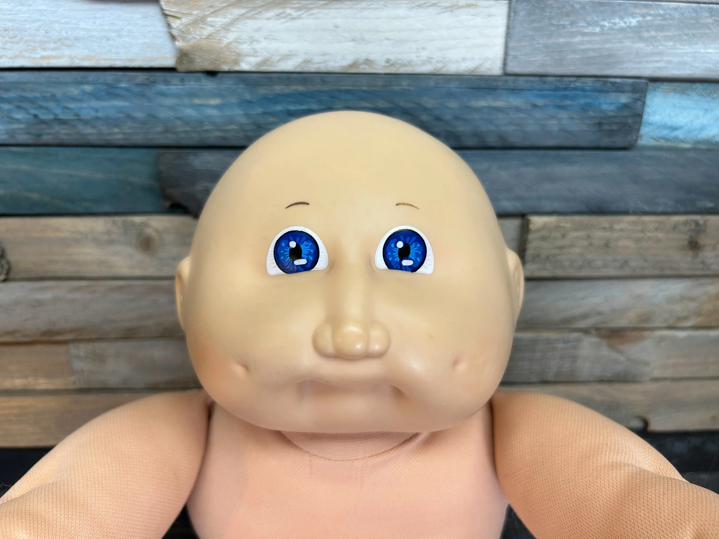 Bald & blue eyes