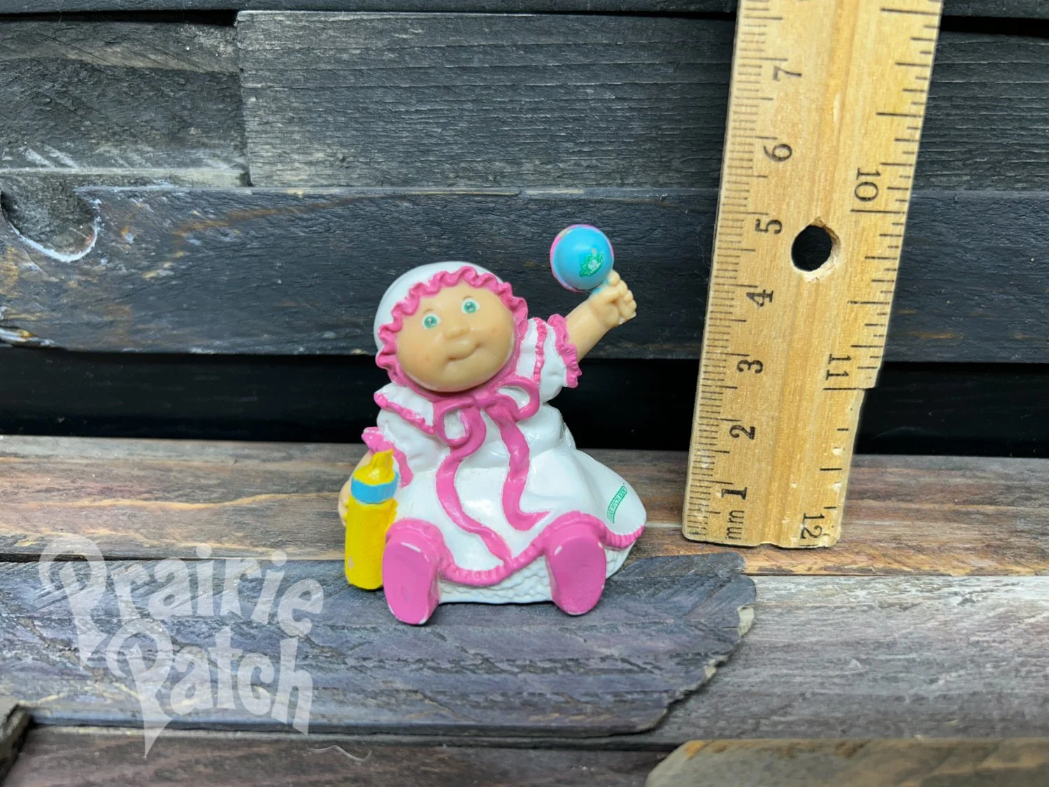 Rattle baby figurine
