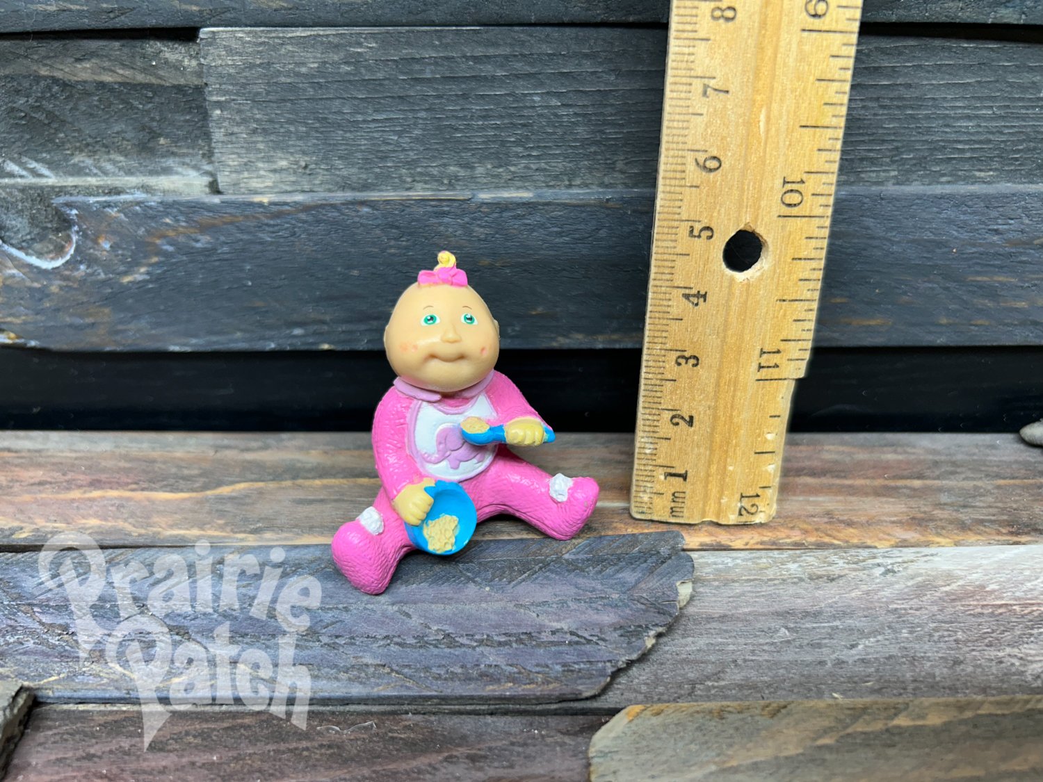 Eating baby figurine