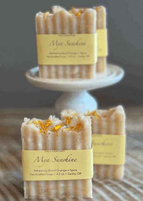 kays-essentials-mya-sunshine-natural-made-soap-on-table-and-on-white-pedestal.jpg