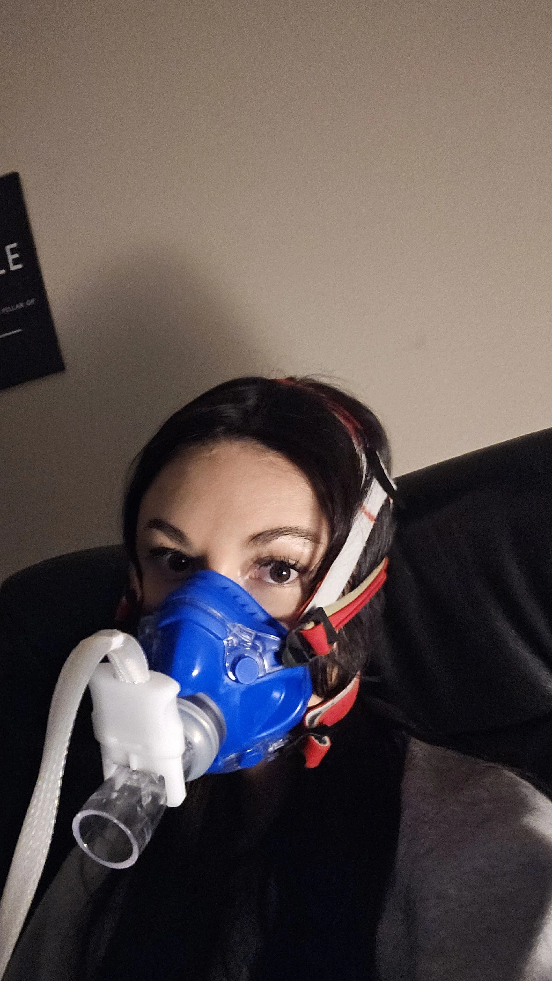 Cailey wearing the breathing mask during a resting metabolic rate test