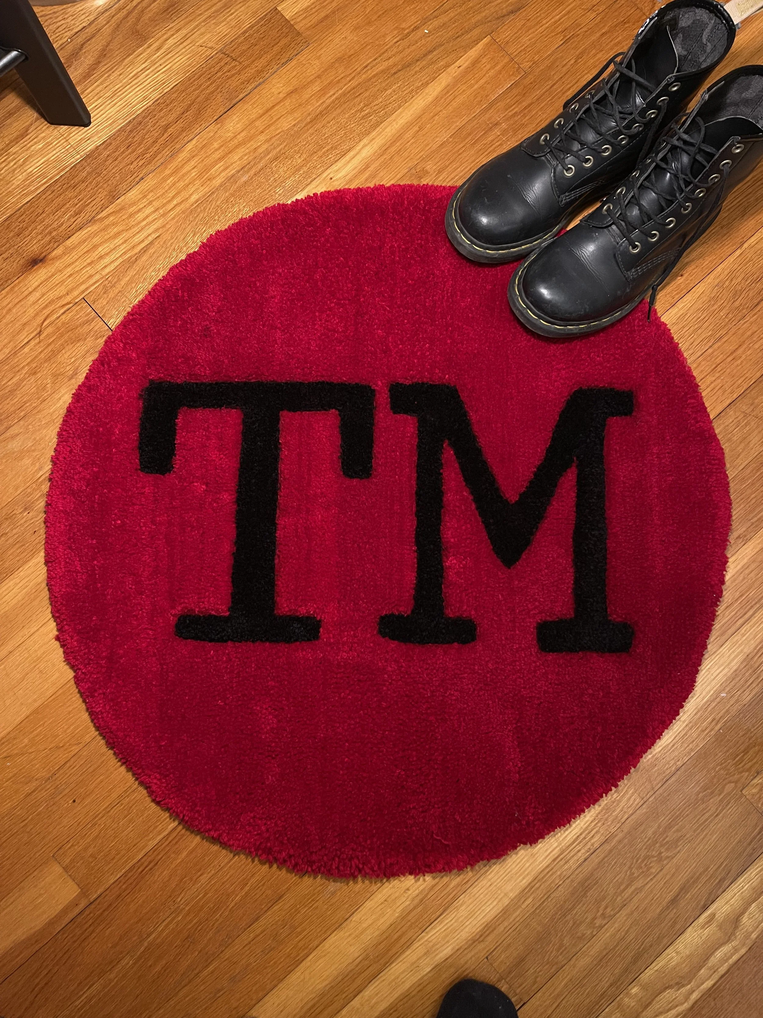 TASKMASTER LOGO RUG