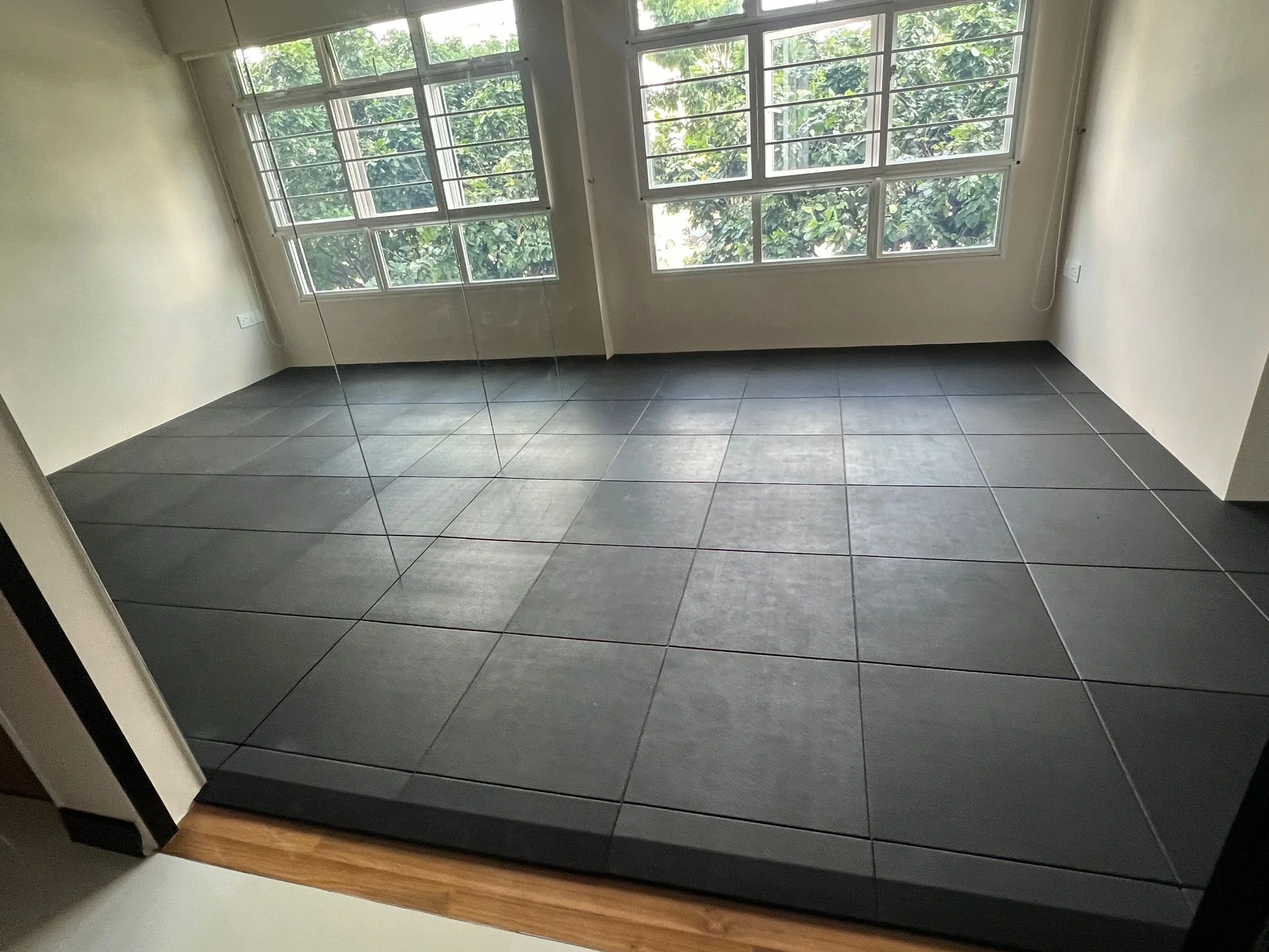 Gym Flooring and Mirrors: The Foundation of a Safe, Functional Training Space