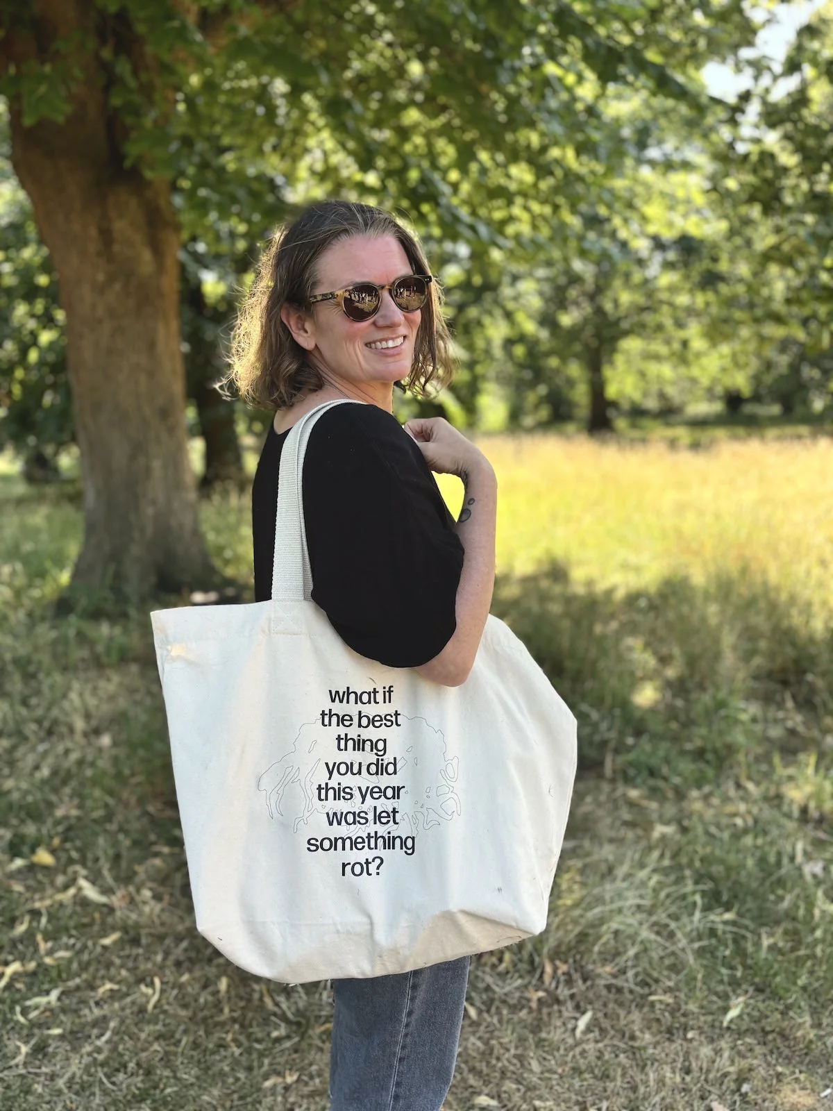 Women with tote bag 'what if the best thing you did this year was let something rot'