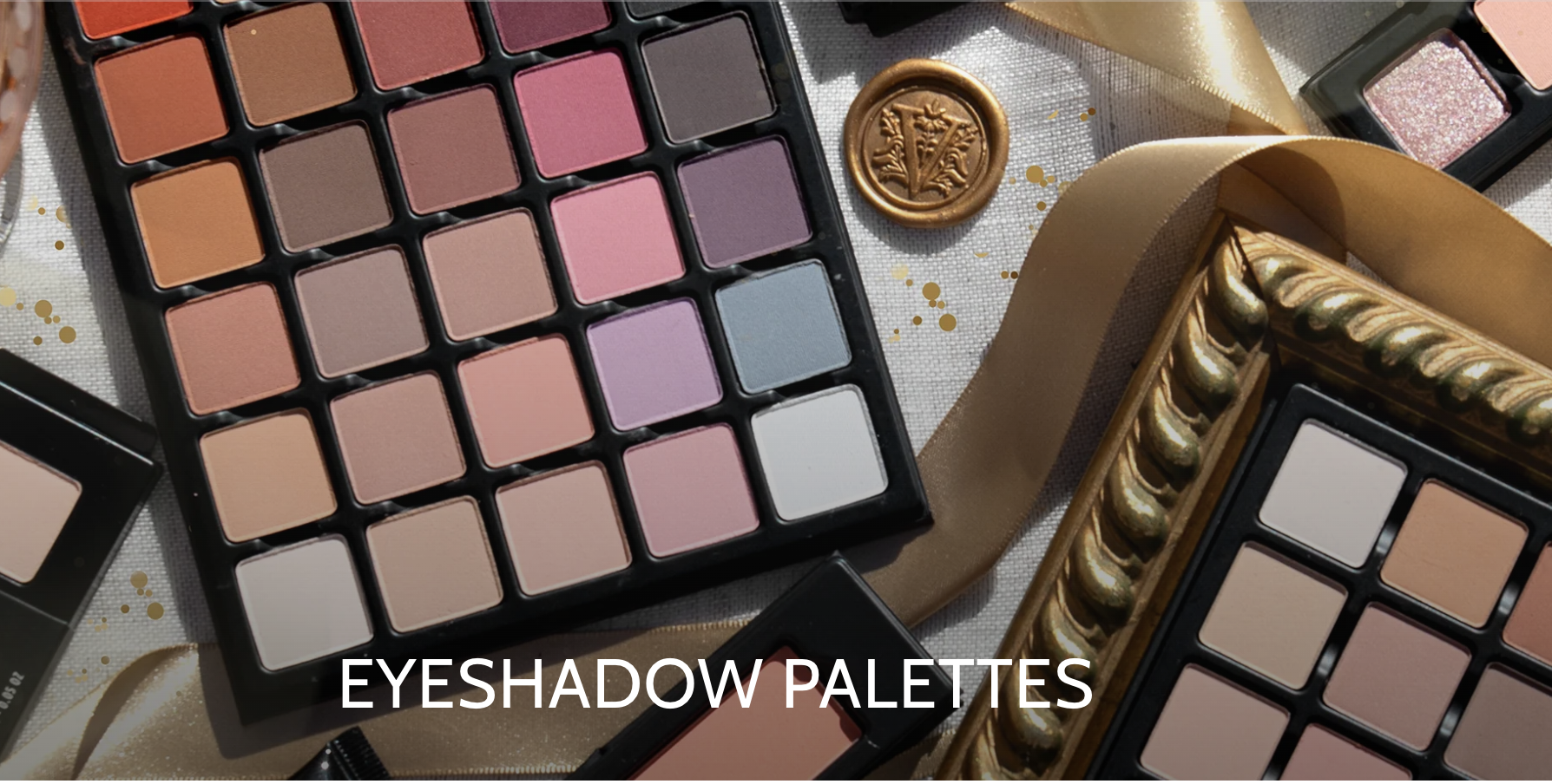 Viseart Eyeshadow palettes laid out on a table