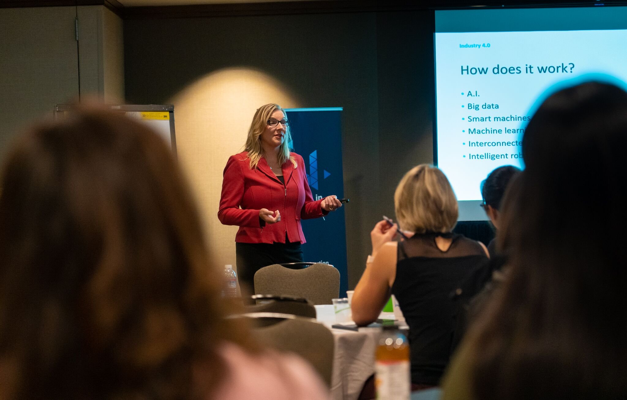 Jenny Moshea presenting at a conference on AEC technology
